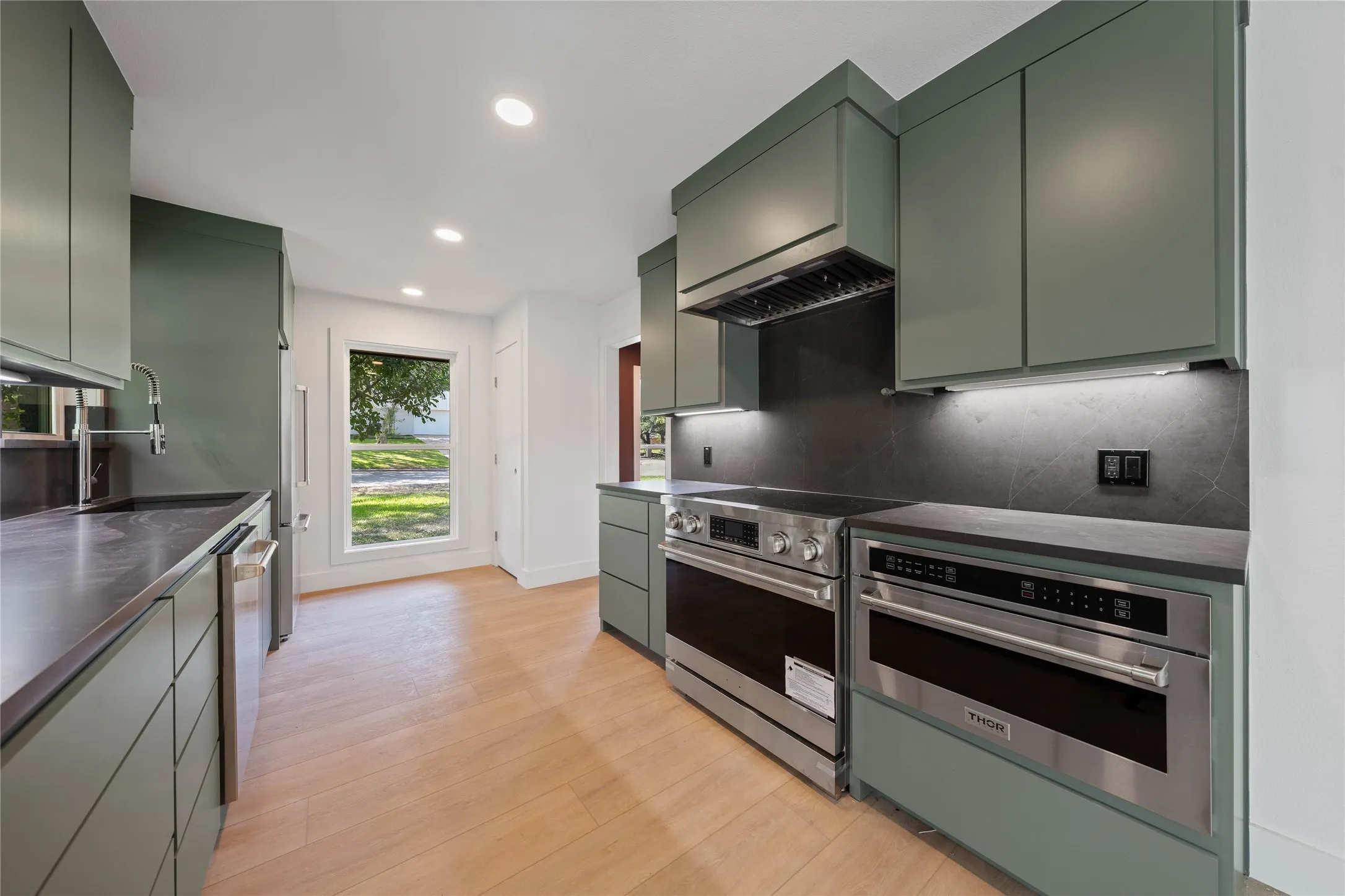 Installed soon: kitchen cabinetry hardware and light fixtures
