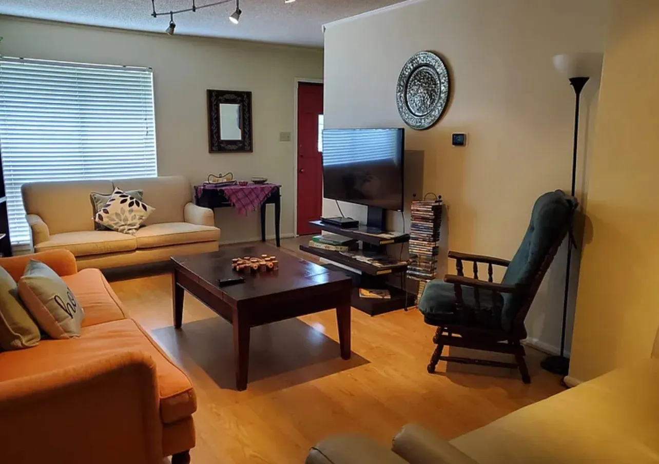 Light-toned wood-finish flooring throughout the space
