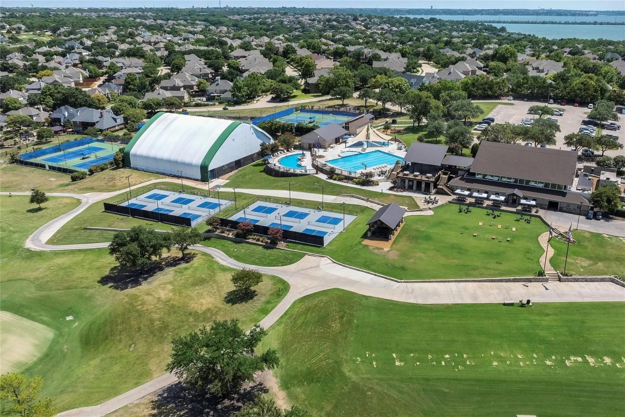 COMMUNITY CLUBHOUSE, RESTAURANT, TENNIS/PICKELBALL COURTS, SWIMMING POOLS