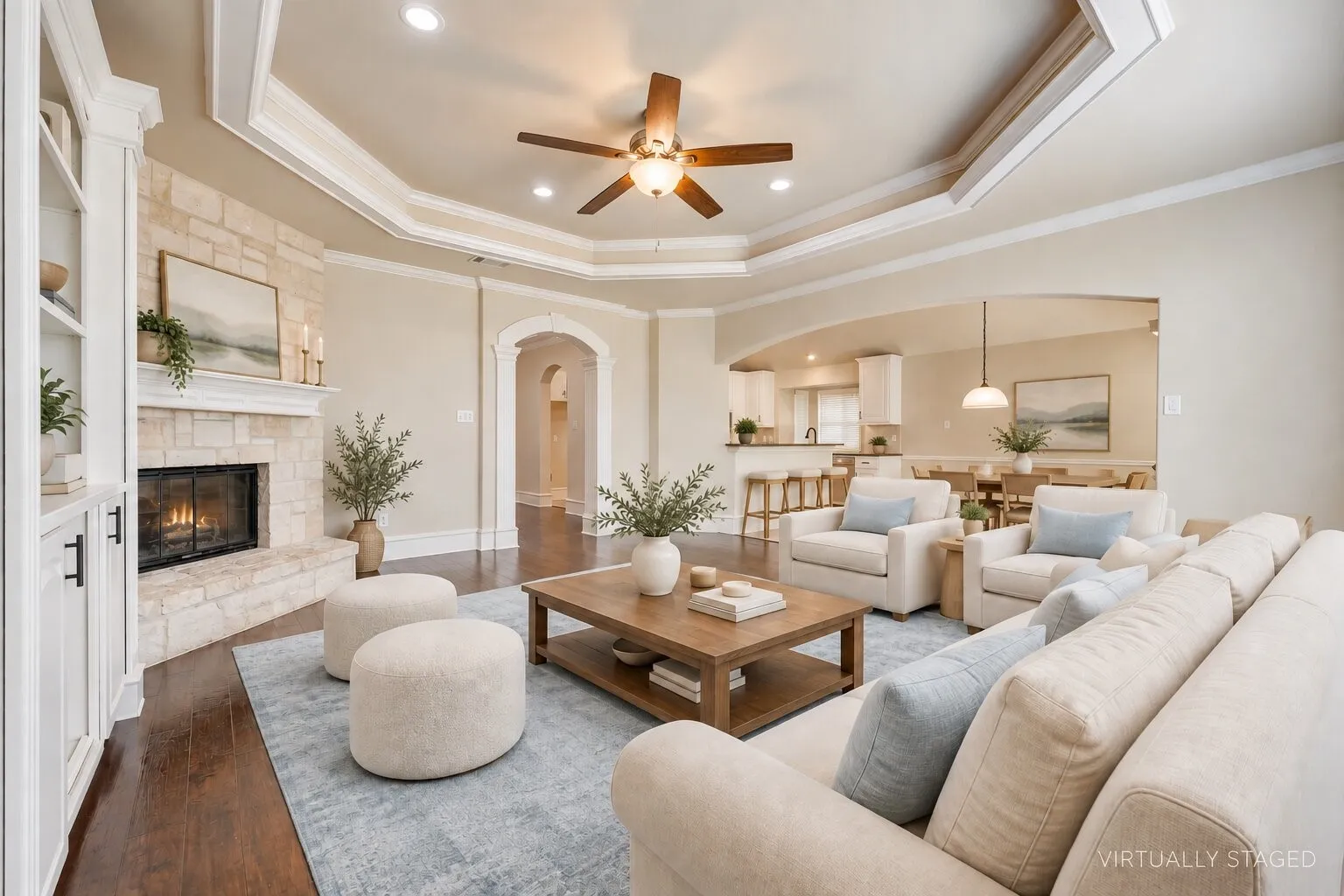 Tray ceiling with recessed lighting and a ceiling fan
