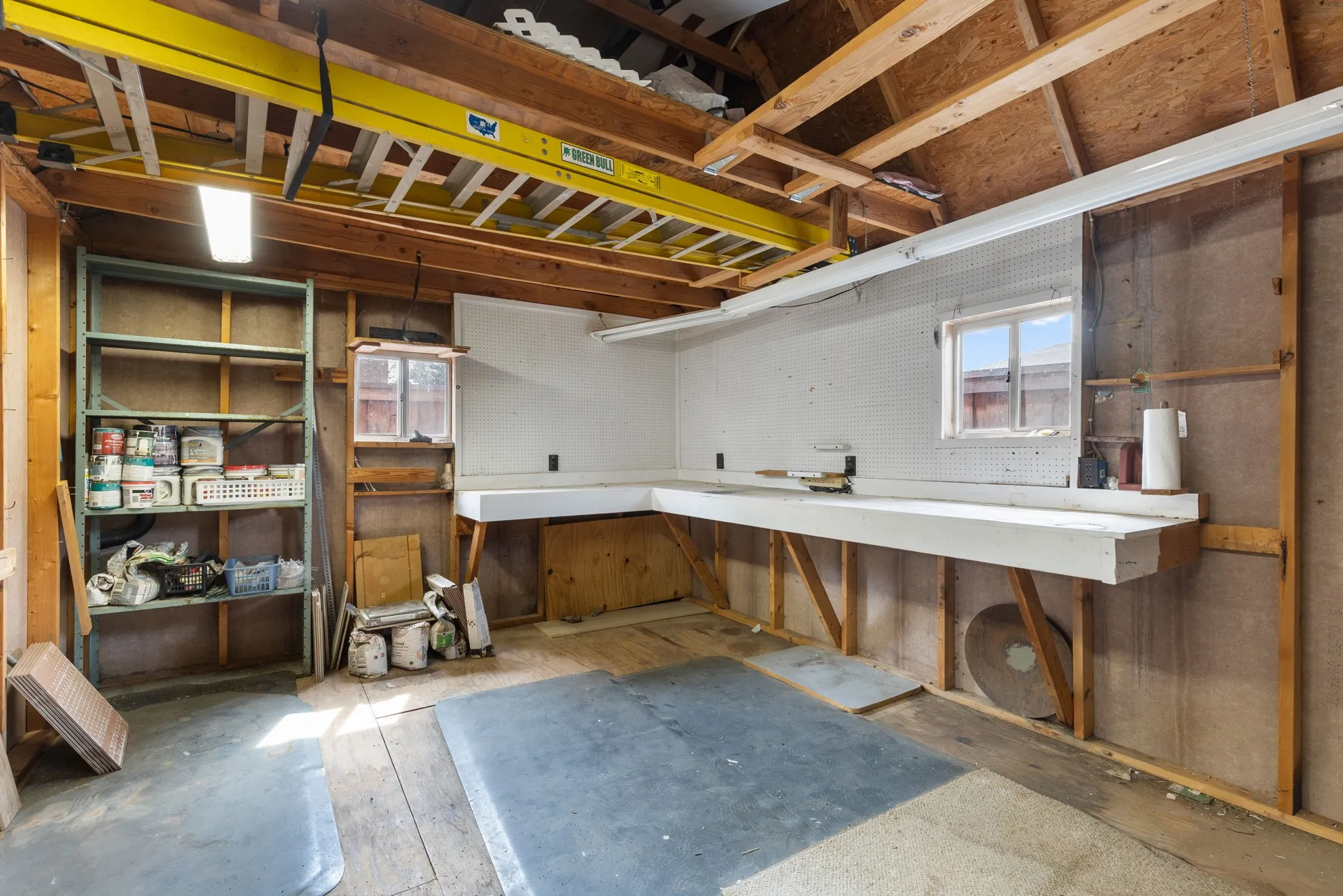 Workshop with electricity, windows, lots of extra storage.