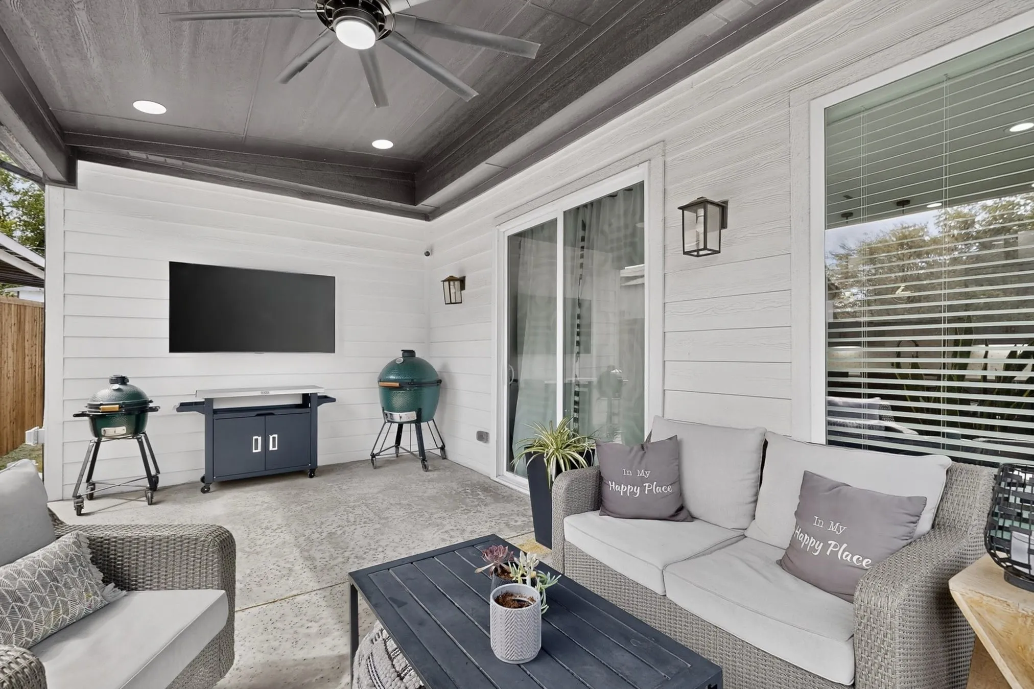 Covered patio featuring a ceiling fan, recessed lighting, and a mounted flat-screen television
