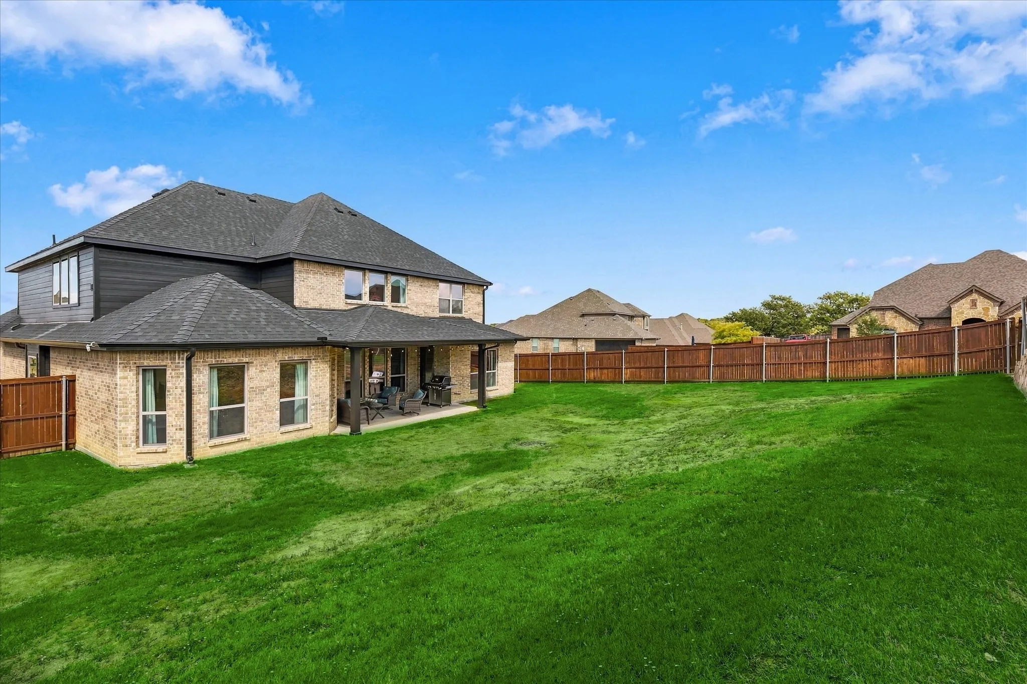 The backyard is just the right size for a pool, or playset, or even tiered​​‌​​​​‌​​‌‌​‌‌​​​‌‌​‌​‌​‌​​​‌​​ landscaping