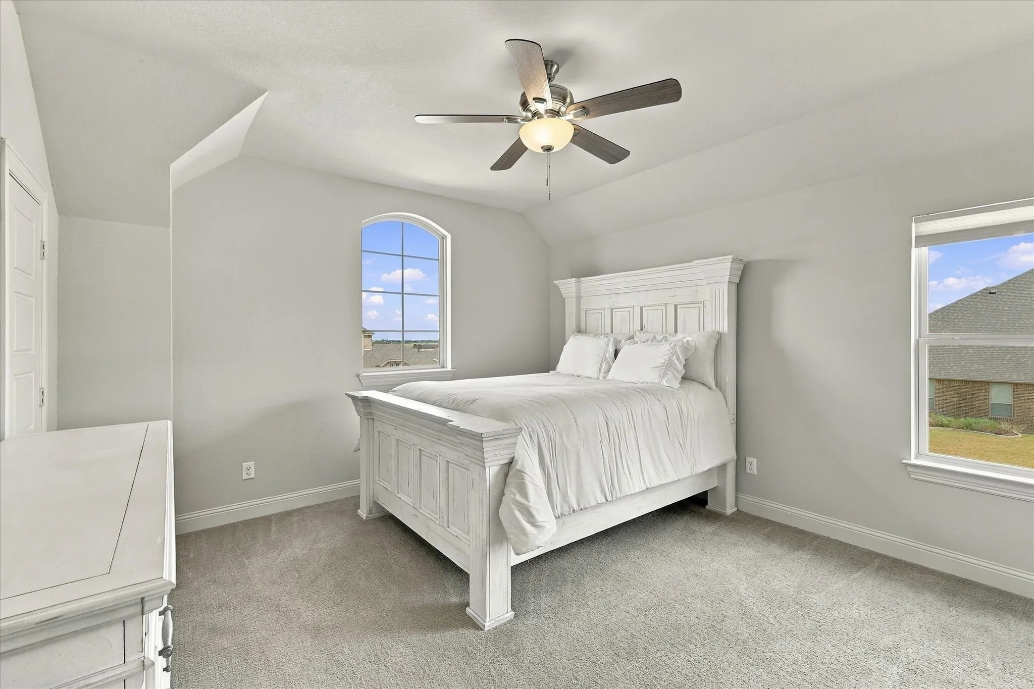 This upstairs bedroom has a generous walk-in closet