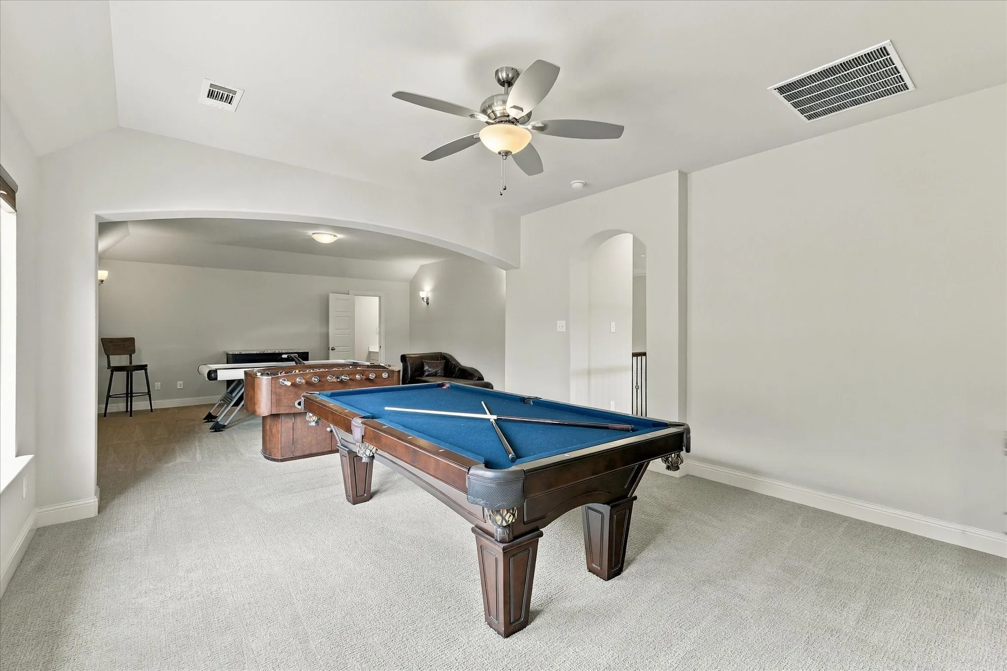 There is also a half-bath upstairs in this space for convenience