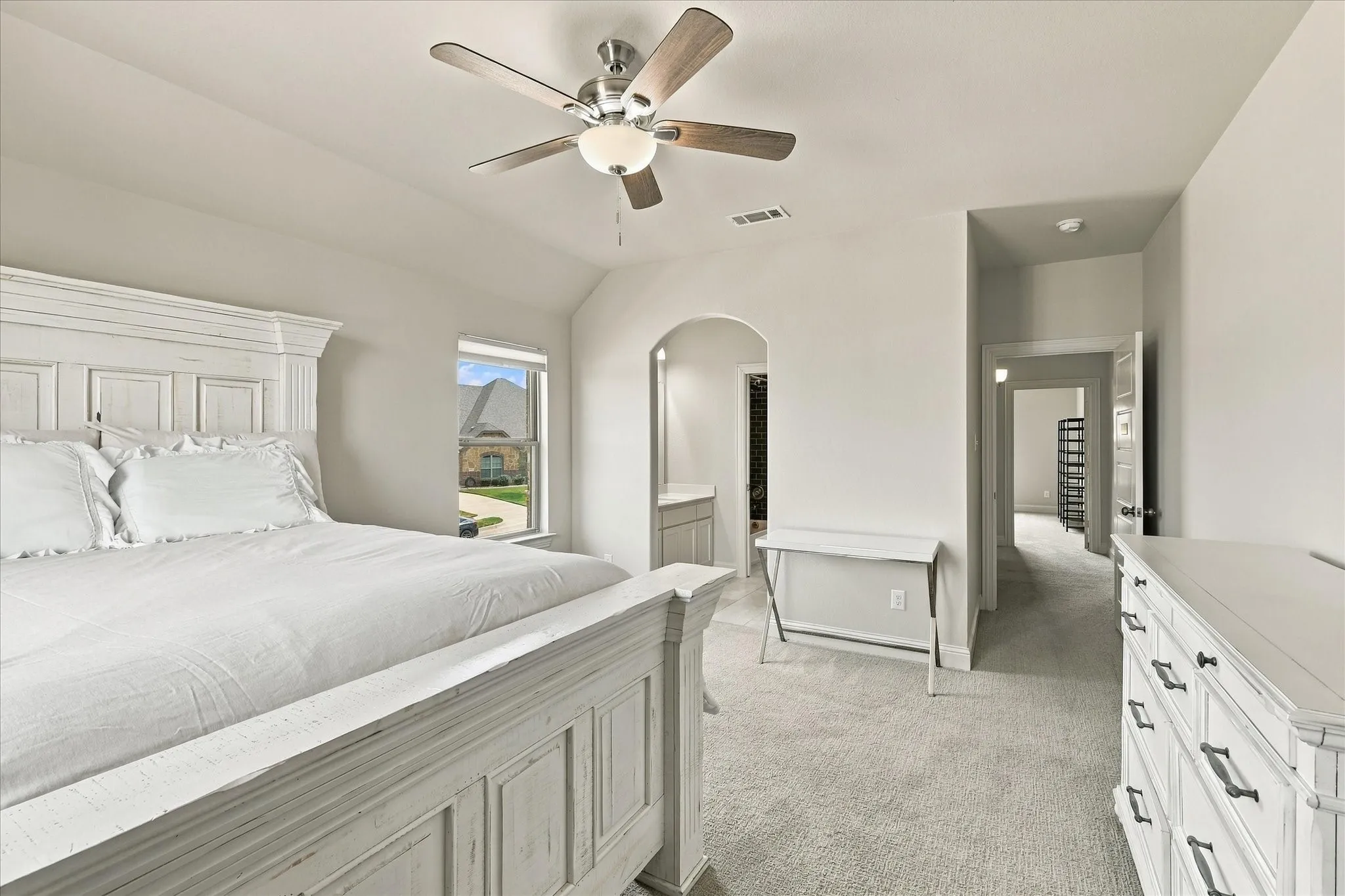 The bedroom connects to a jack-and-jill bath