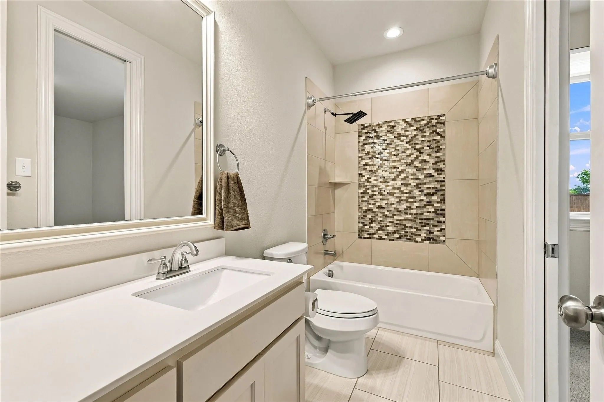 The full bathroom downstairs is an ensuite bath, but has a second entrance for a guest bath