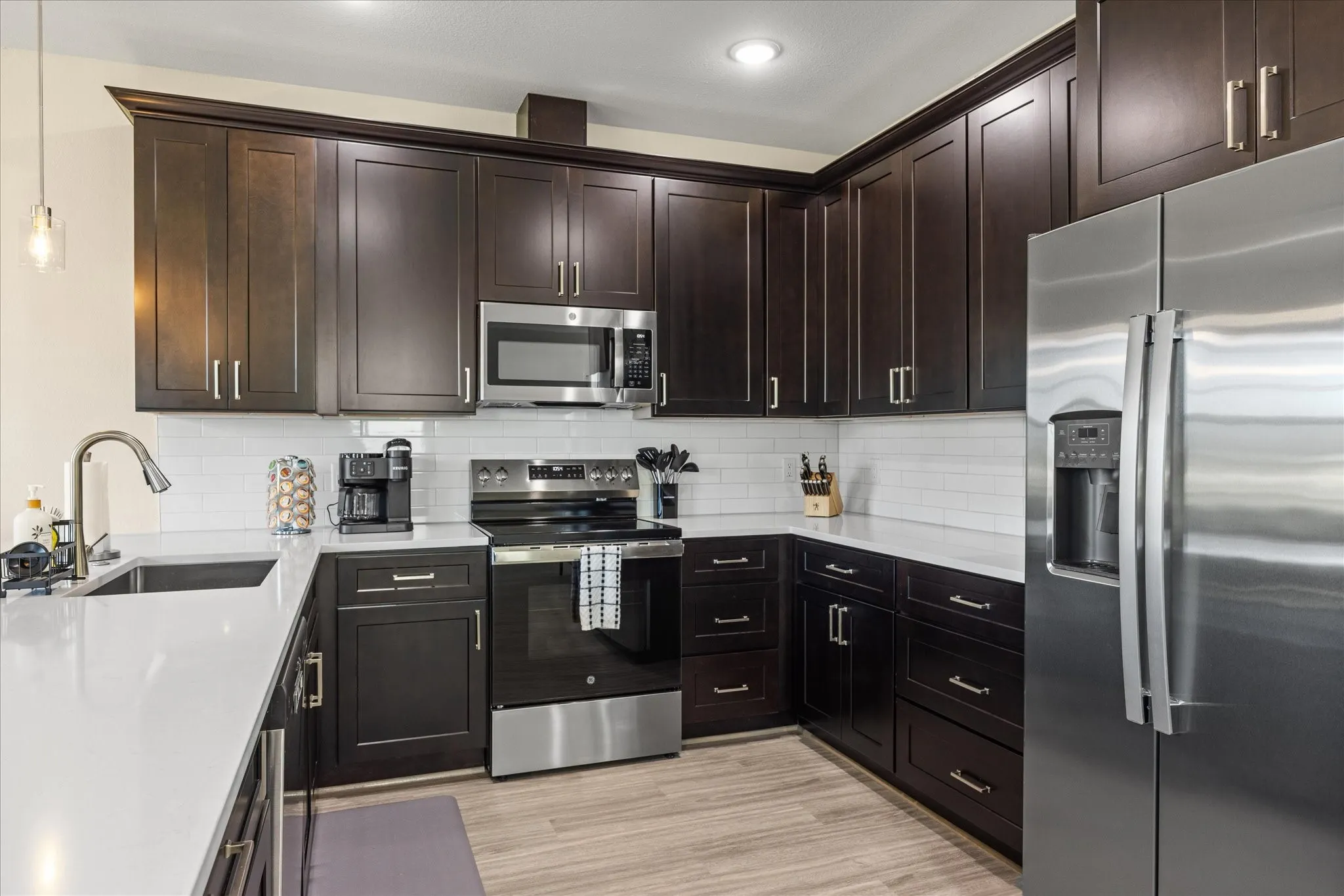 Sample photo of expresso cabinets.
