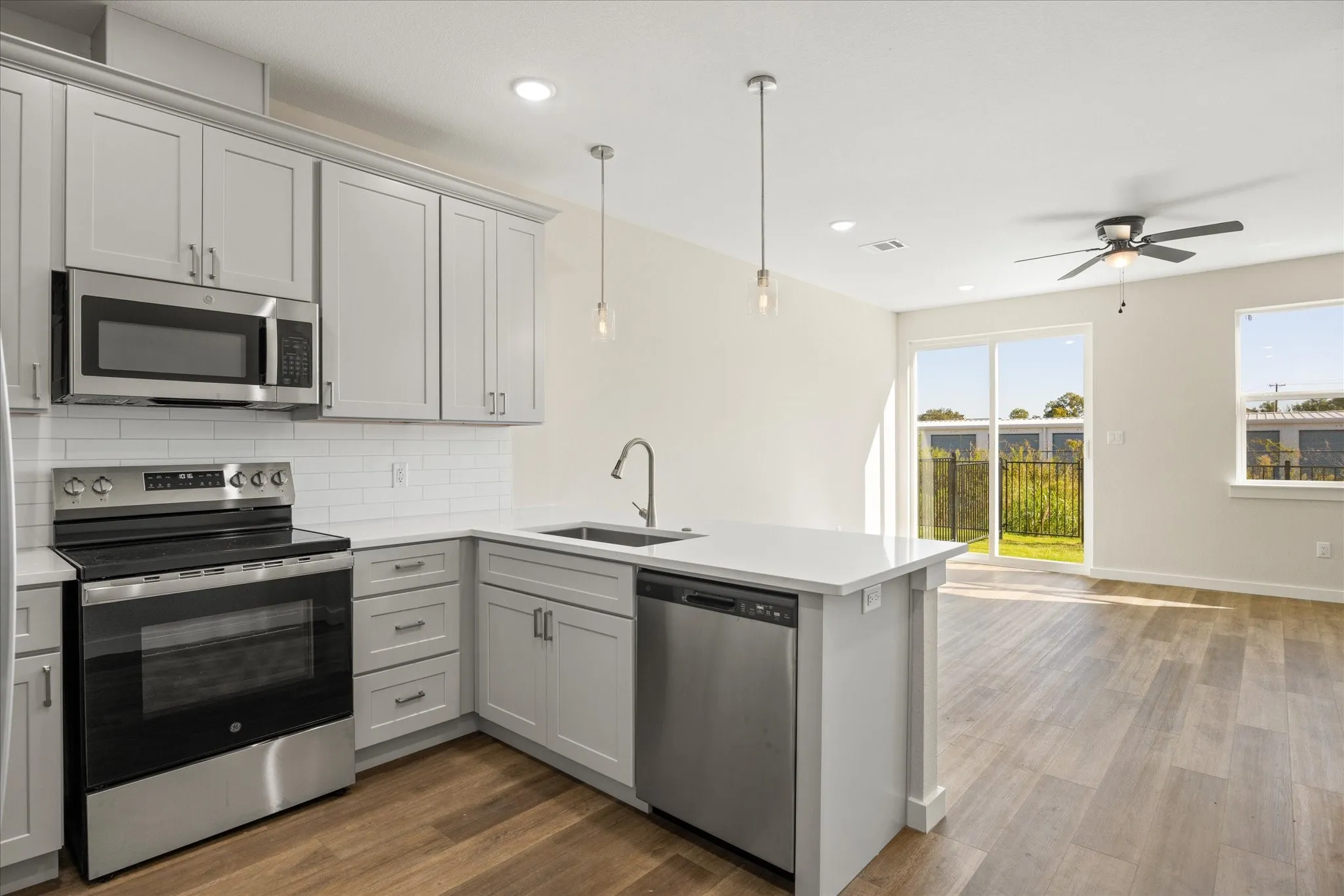 Reflects layout of kitchen but cabinets are expresso not white