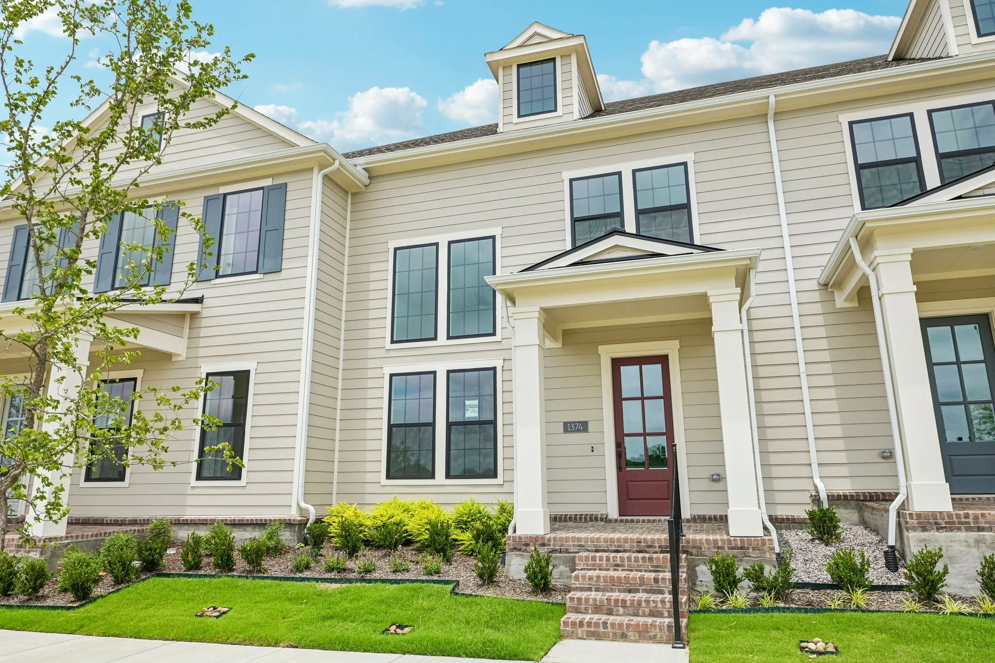 Classically designed architecture and beautiful landscaping create outstanding curb appeal for this dream home!