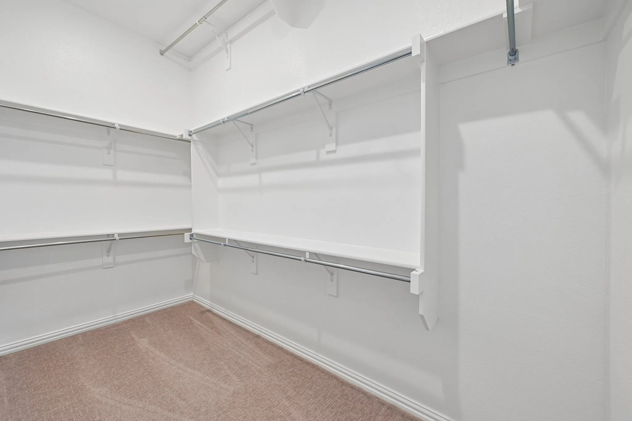 With plenty of space for two and seasonal hanging racks, this dream closet is waiting for you to fill it up!