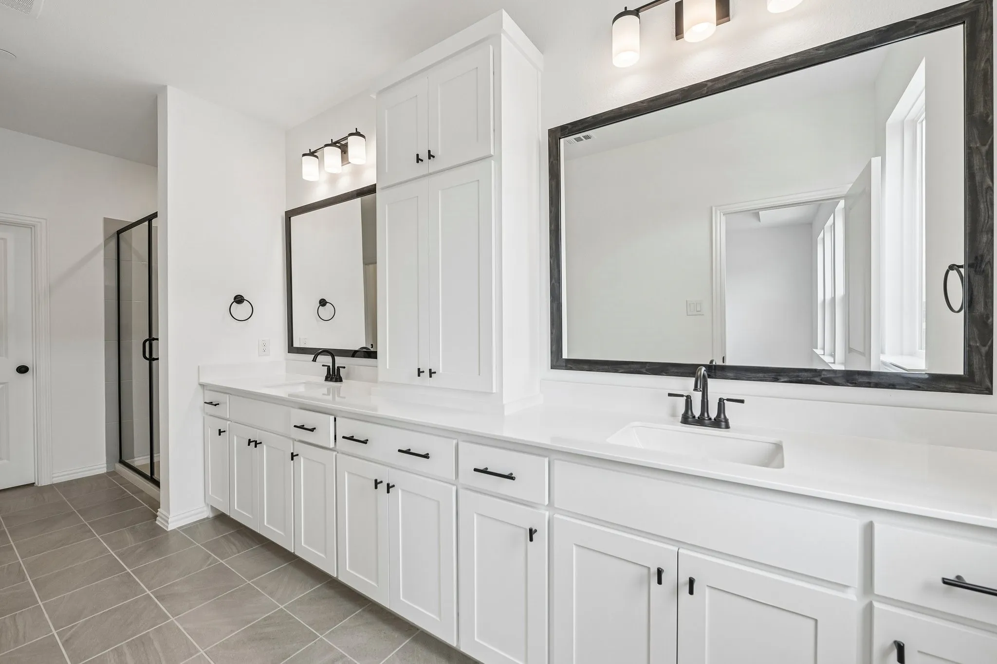 You'll enjoy ample room for two in this outstanding owner's bath!