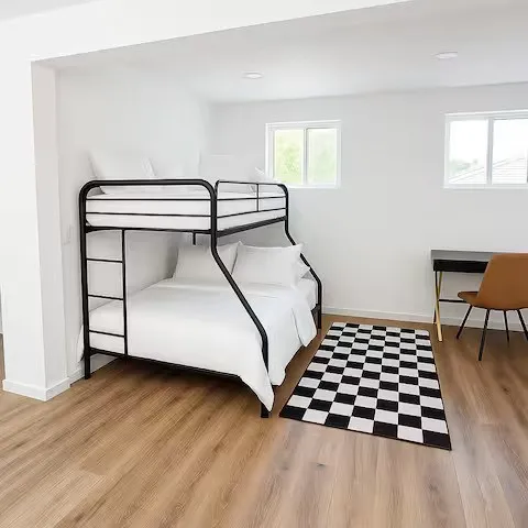 Wood-finish flooring, recessed lighting, and dual windows
