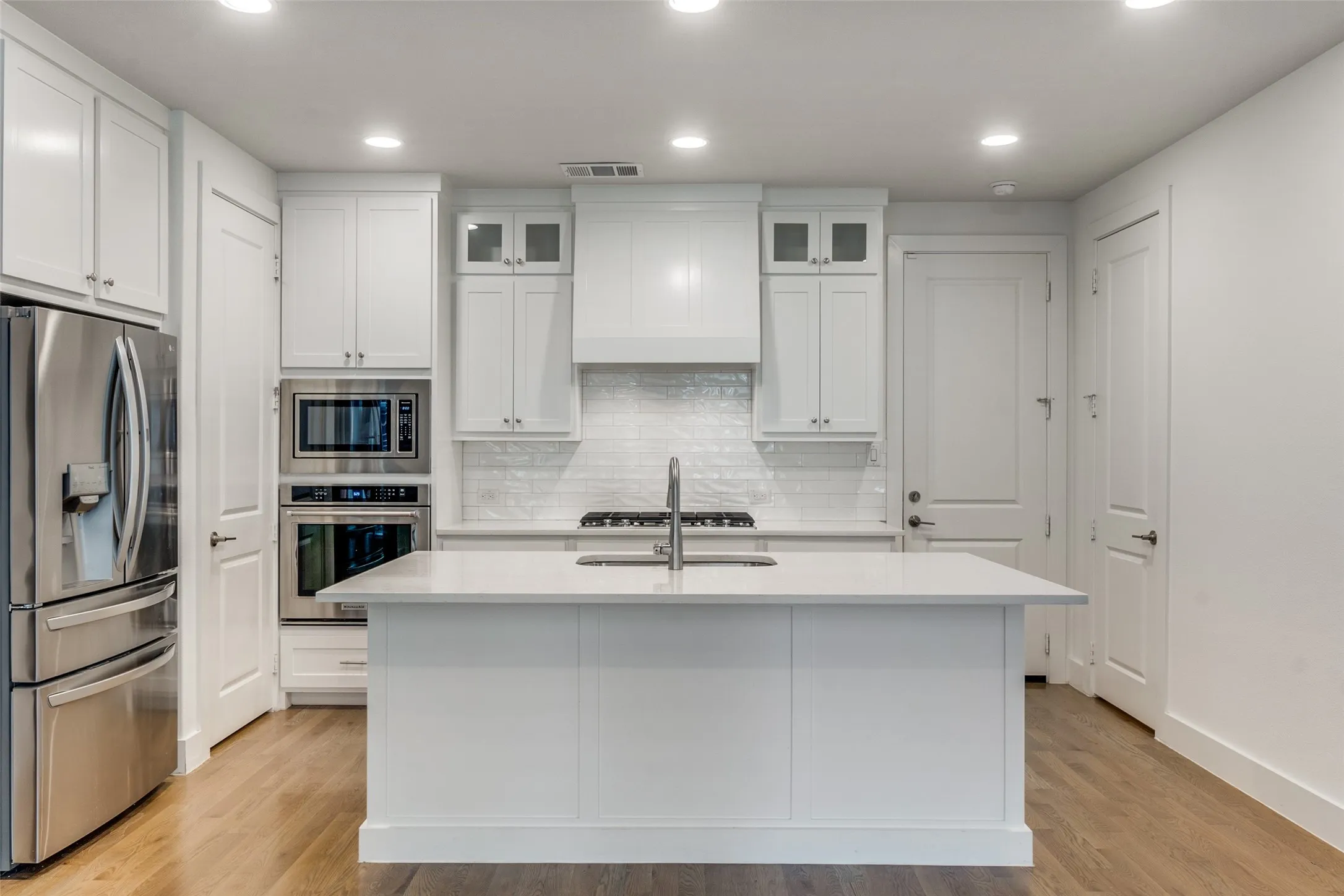 All Stainless Steel Appliances and Gas Stove Top.