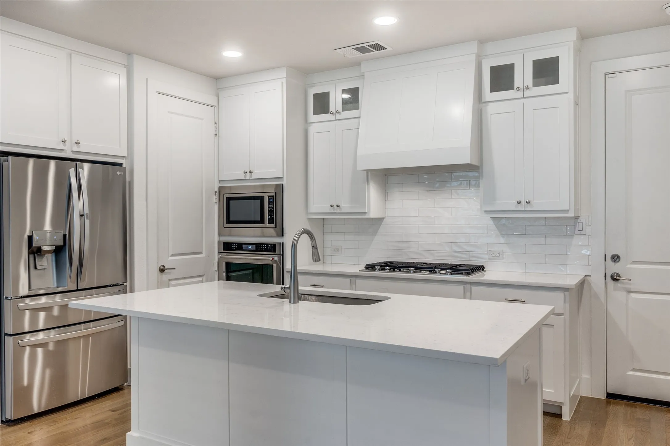 All Stainless Steel Appliances and Gas Stove Top.