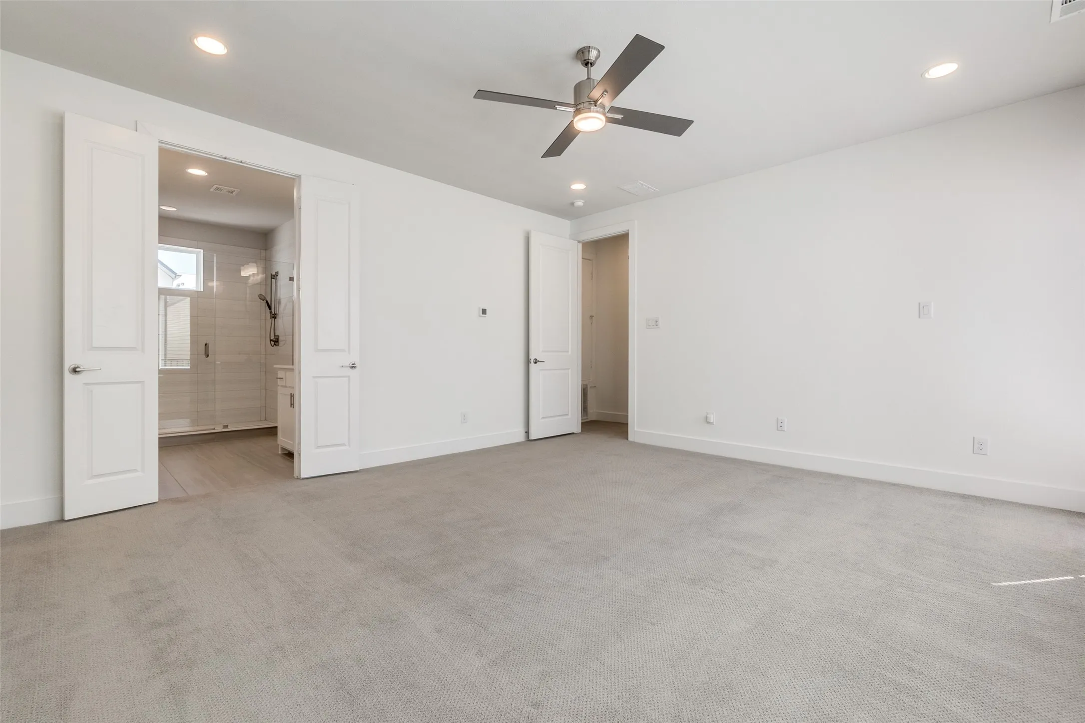 Enjoy the space of this spacious primary escape covering the entire third floor of the home complete with double vanity, large walk in closet, and private balcony.