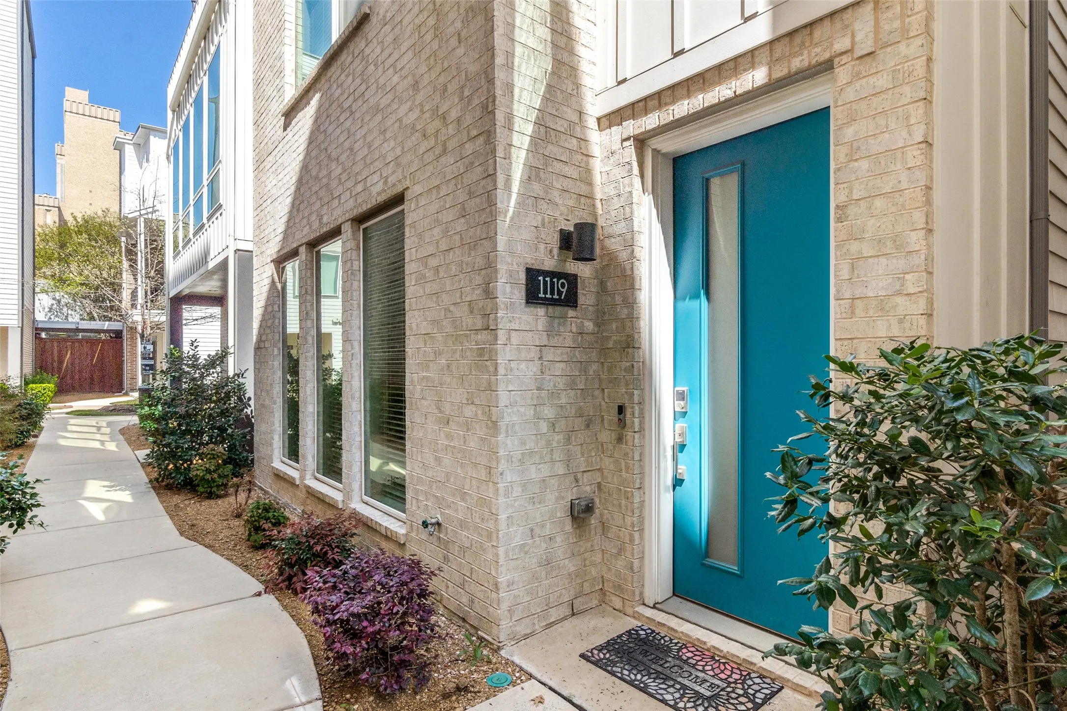Beautifully manicured front entry way. Packages will be delivered right to your doorstep and kept safe behind community gate!