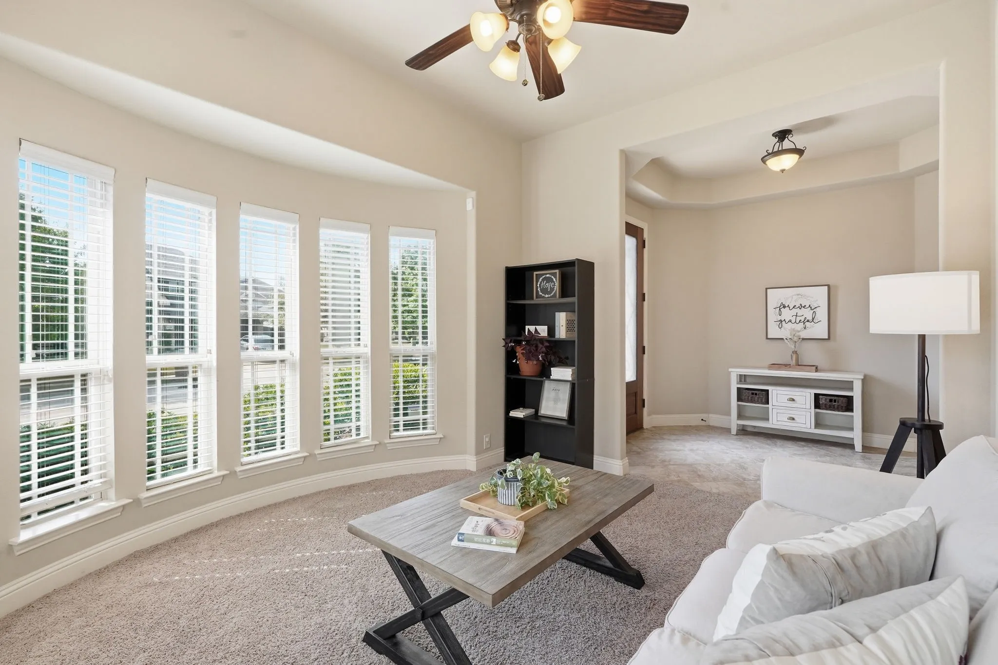 Beautifully curved wall of windows in formal living