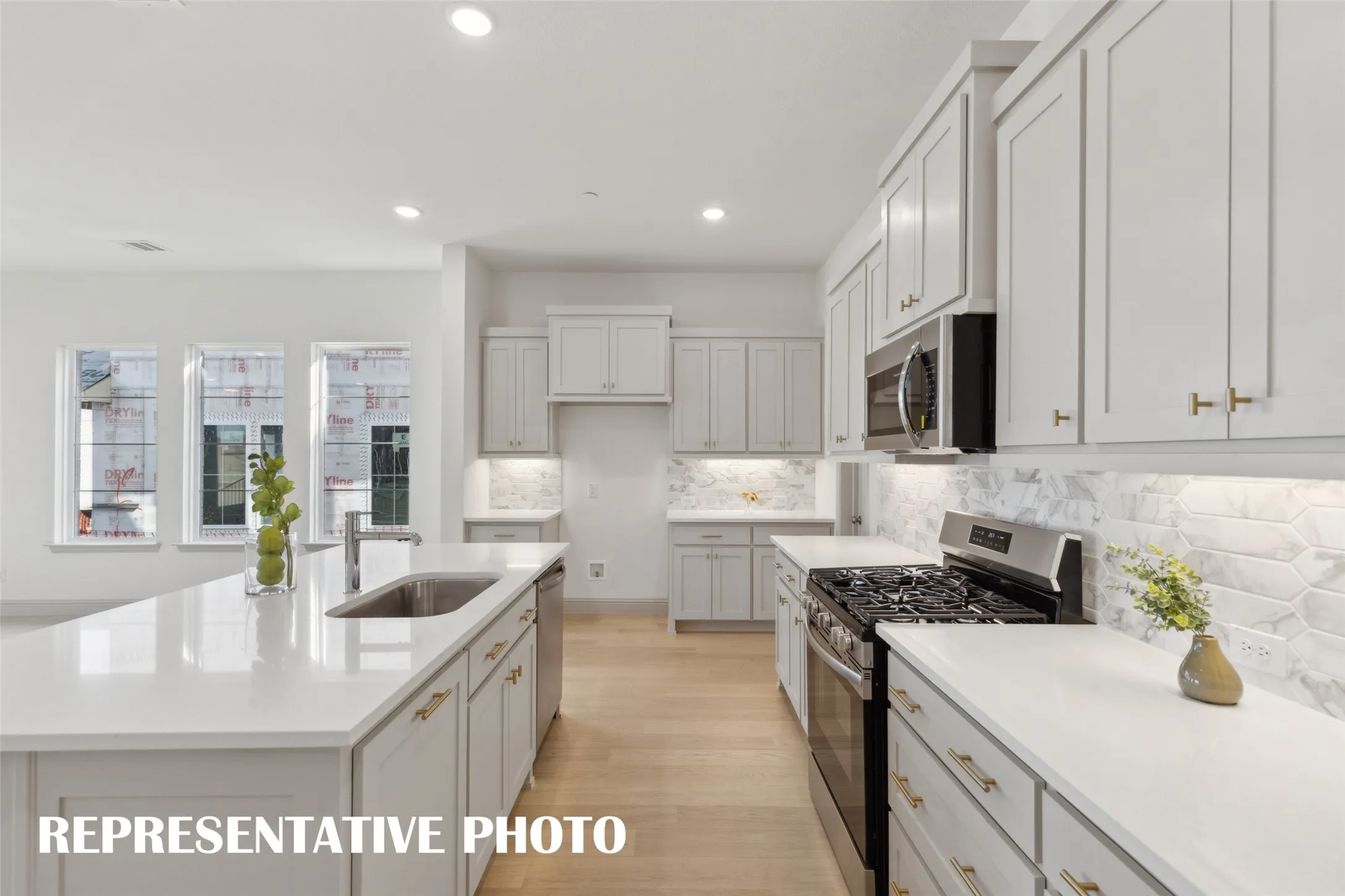 No shortage of style, prep or storage space in this over the top dream kitchen!  REPRESENTATIVE PHOTO