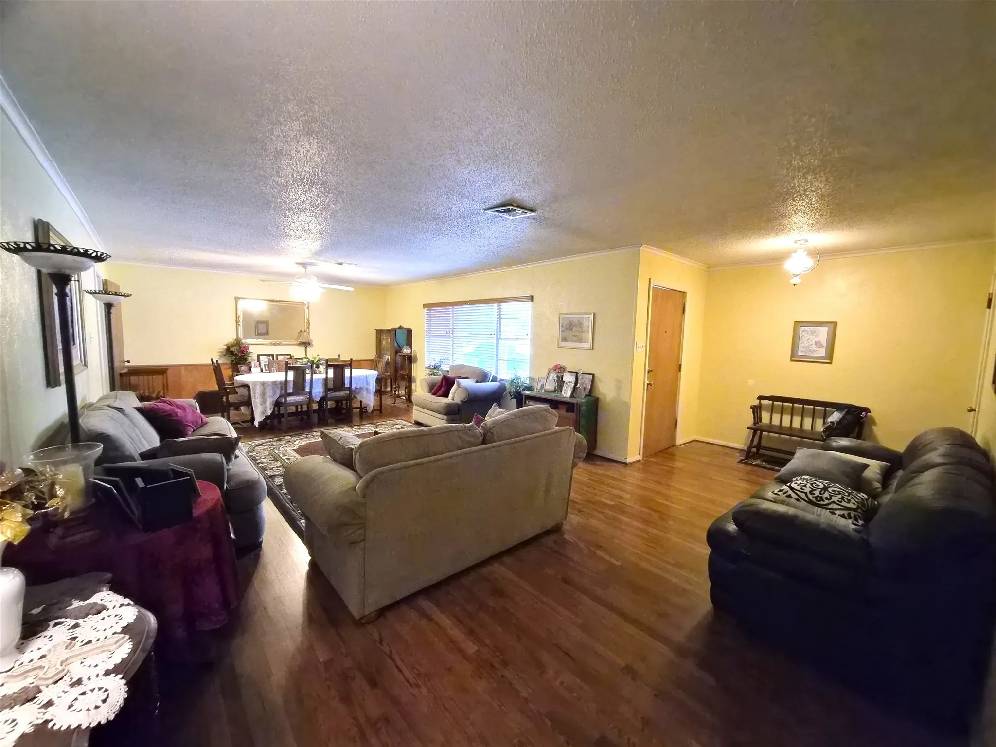 Formal living and dining area with big picture window.