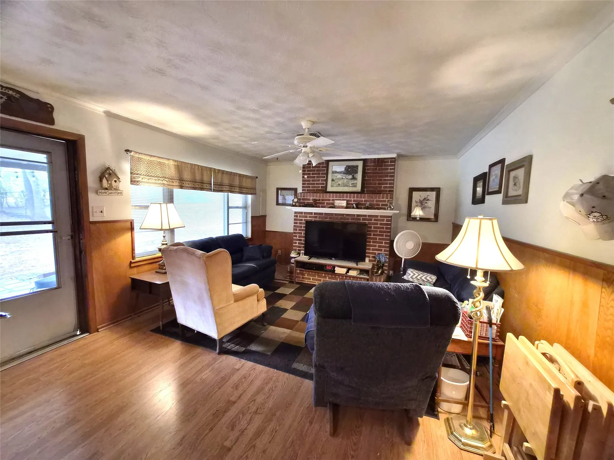 Brick fireplace in family room.