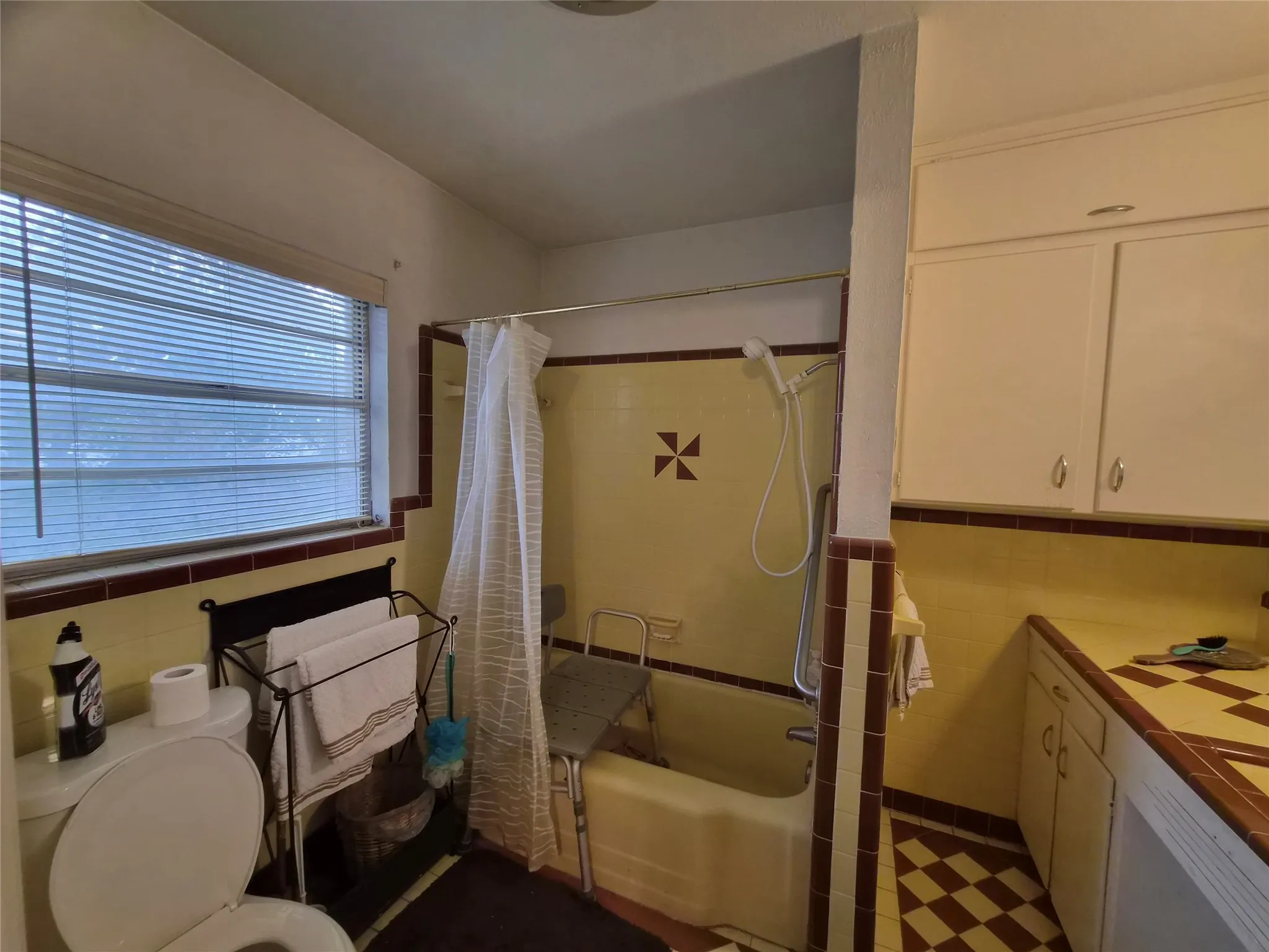 Master bath lots of cabinet space and tub and shower combination.