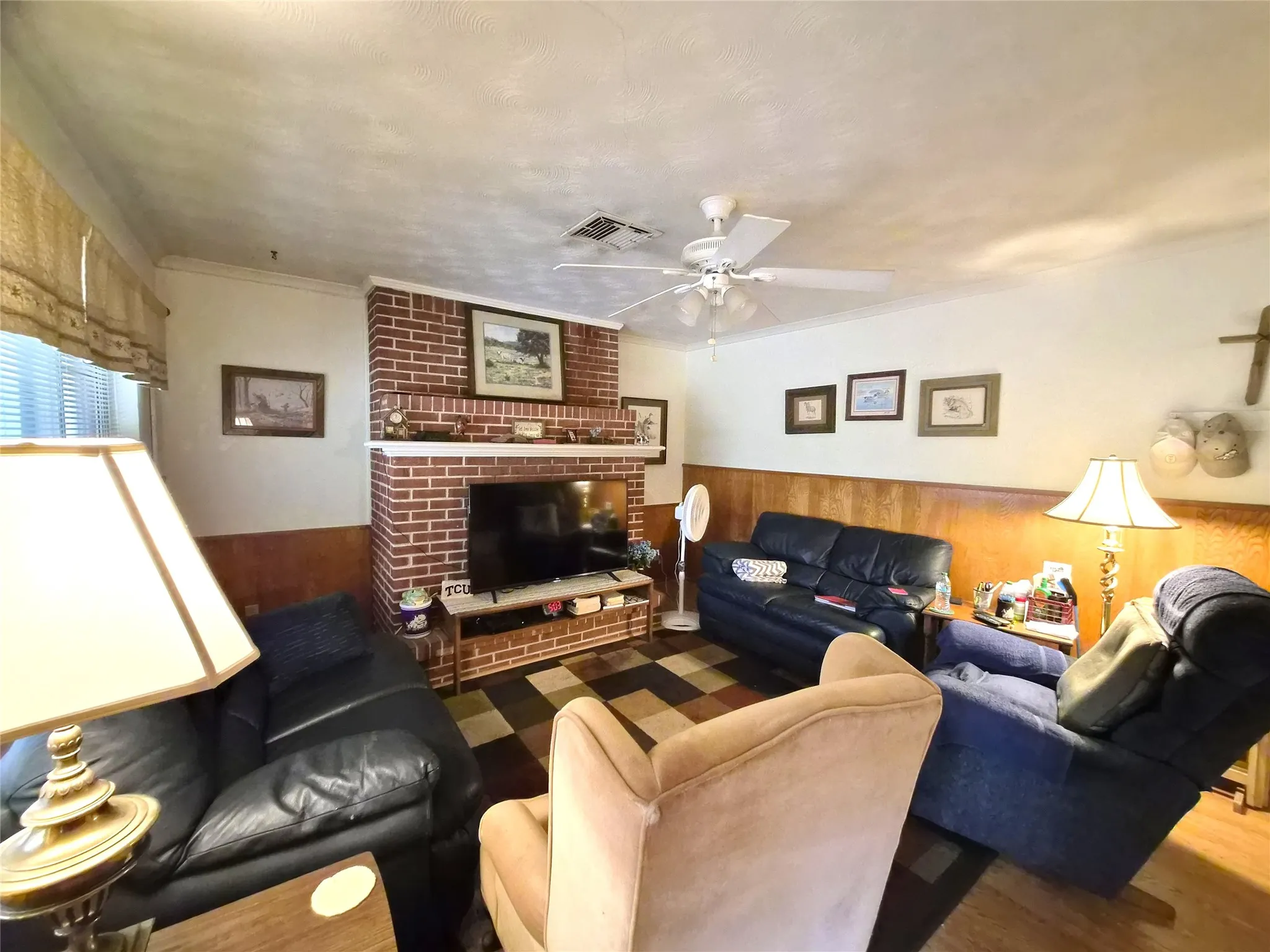 Open floor plan with family room, kitchen, and breakfast area.