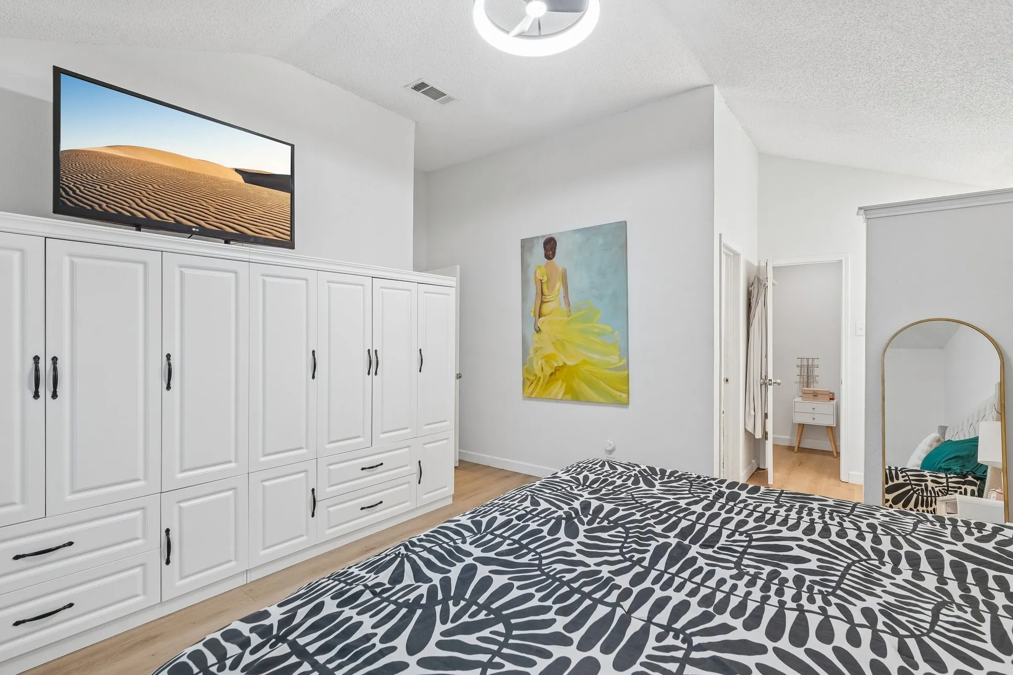 Another view of primary bedroom