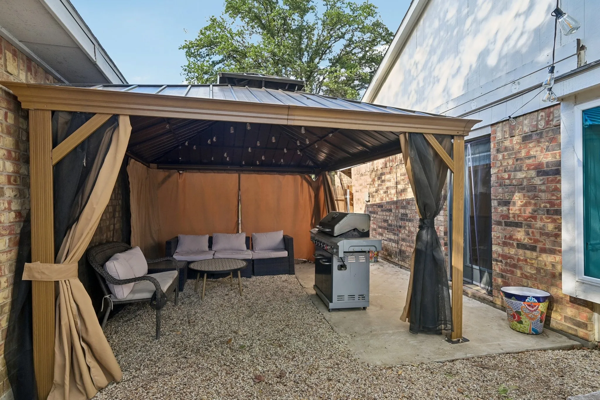 Side yard with Pergola that will remain with the home