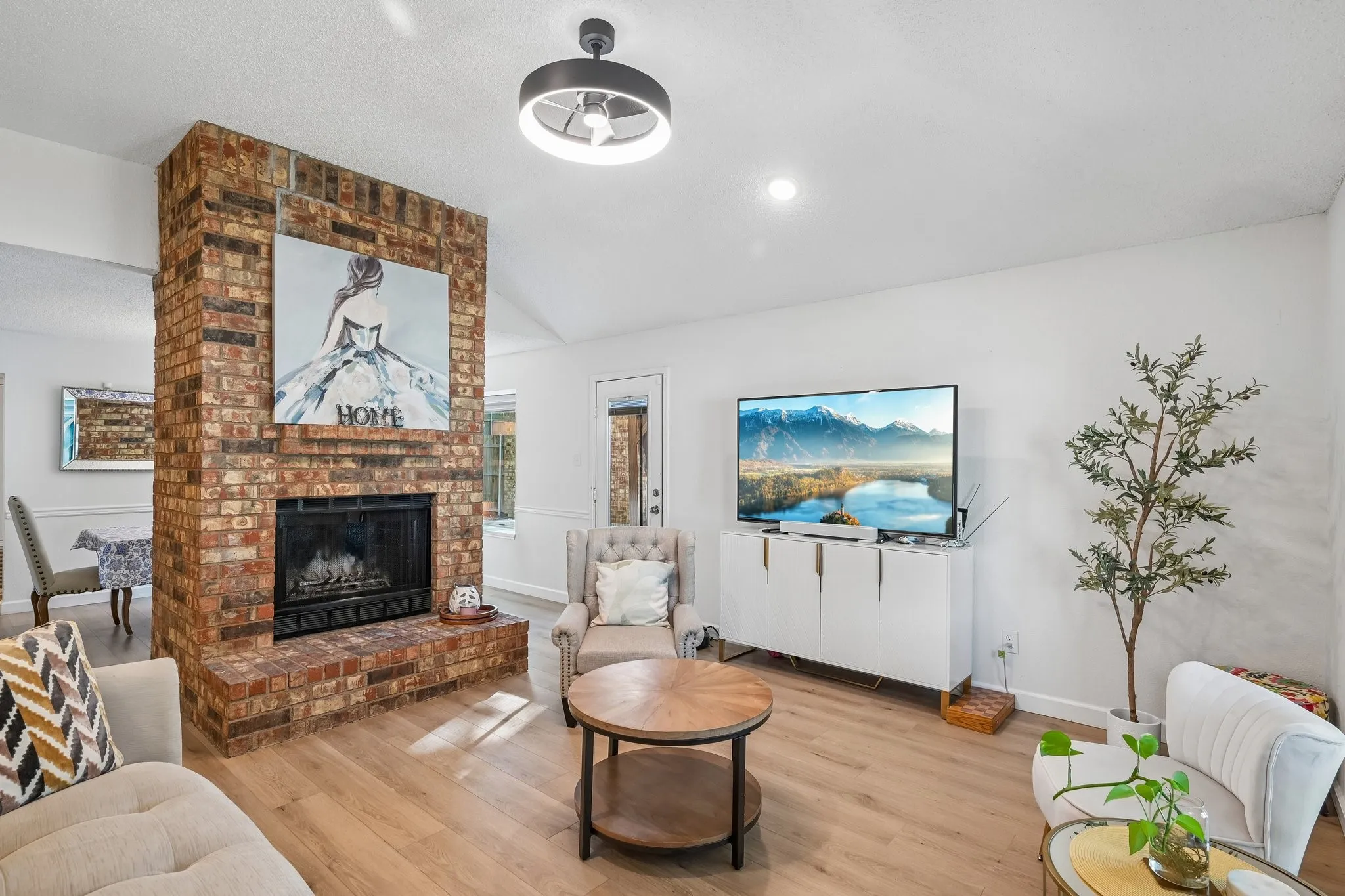 Living room featuring wood burning fireplace