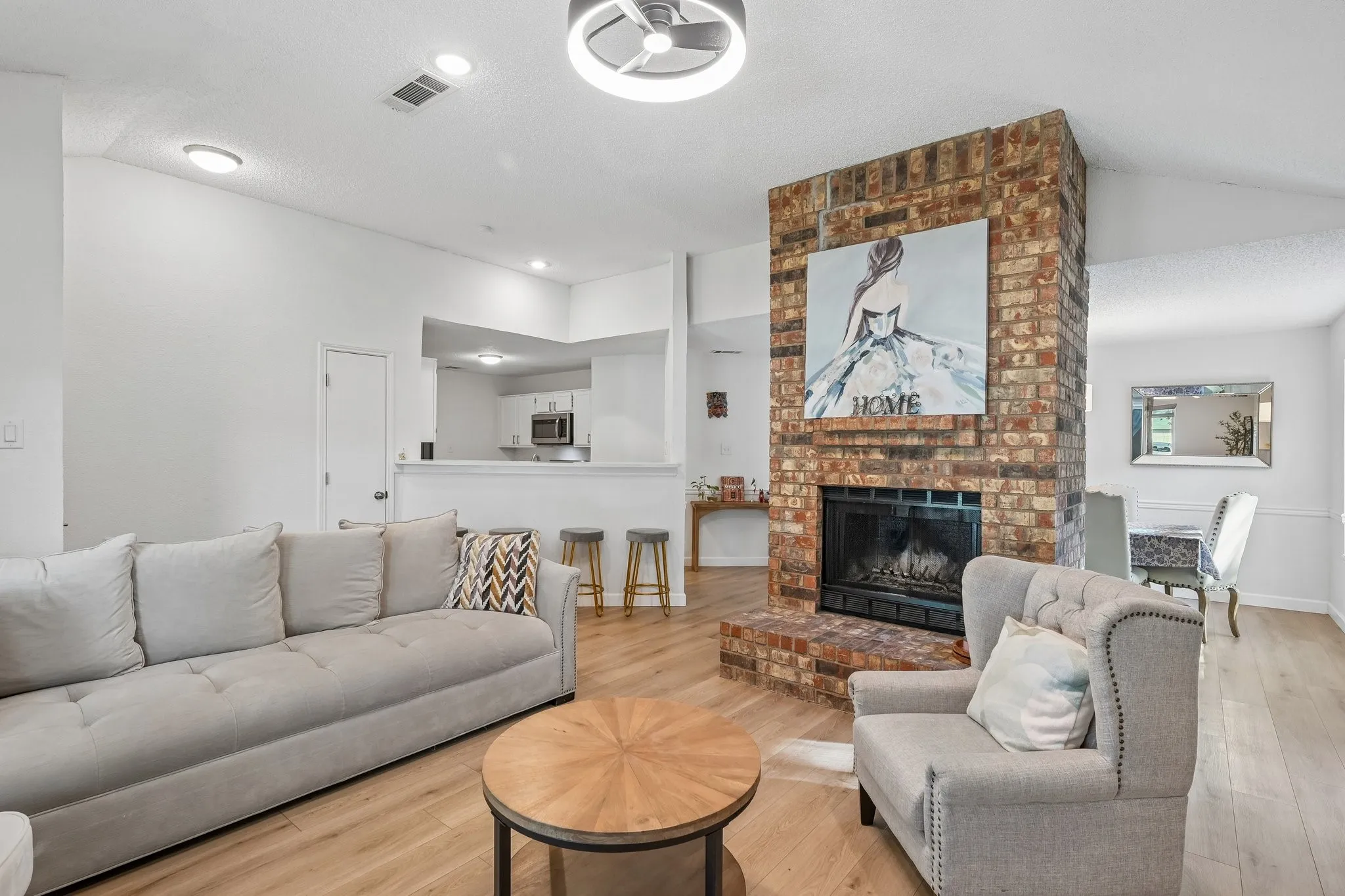 Living room with wood burning fireplace