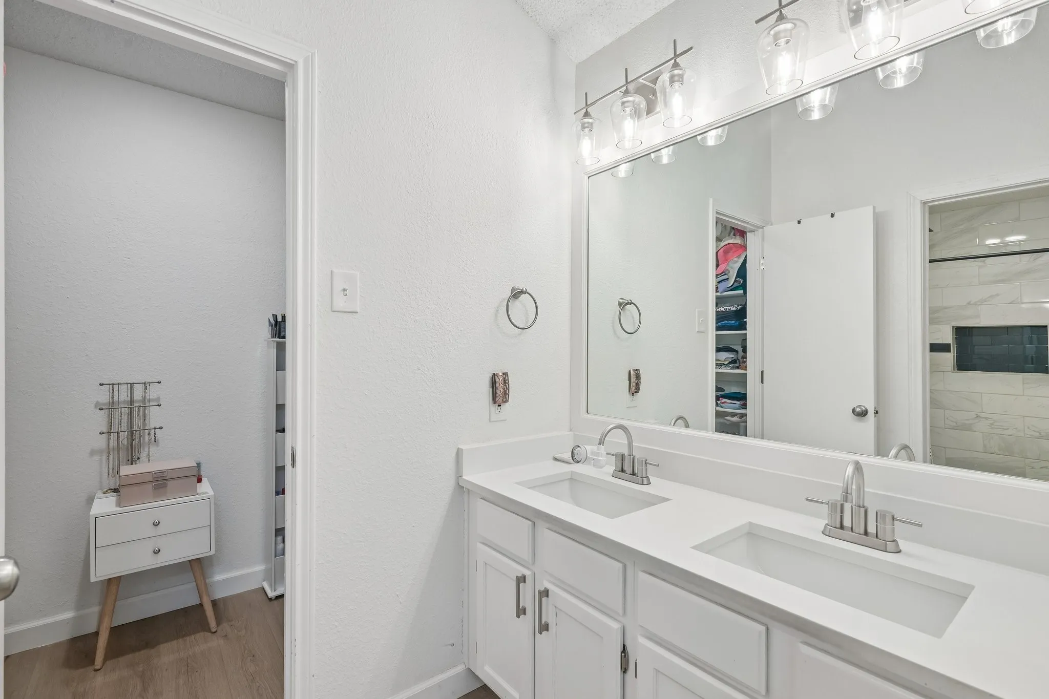 Updated vanity and lighting in primary bath