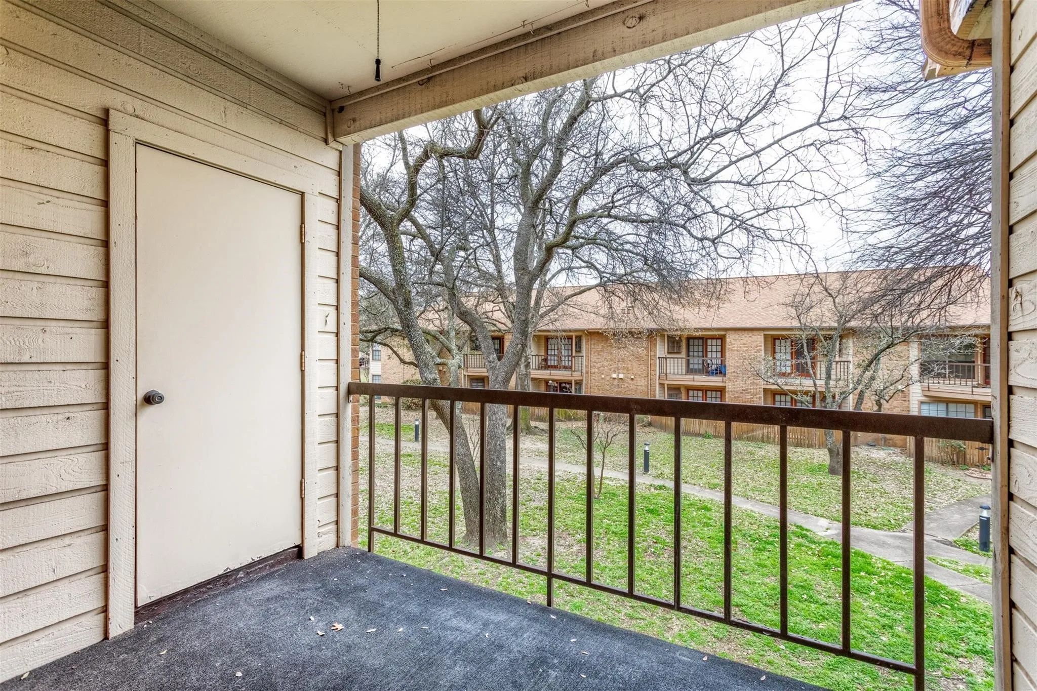 Balcony overlooks greenspace and has a storage closet available for use.