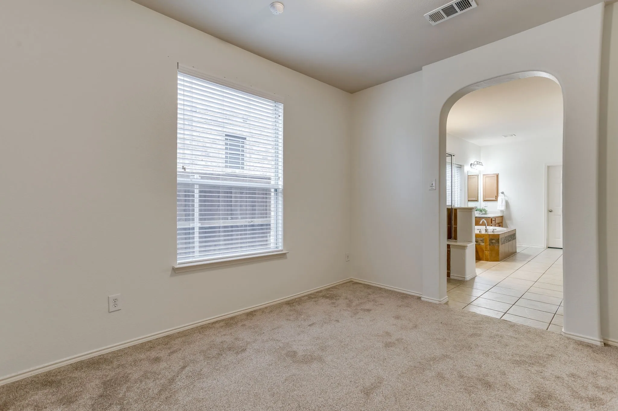 Private space off primary bathroom