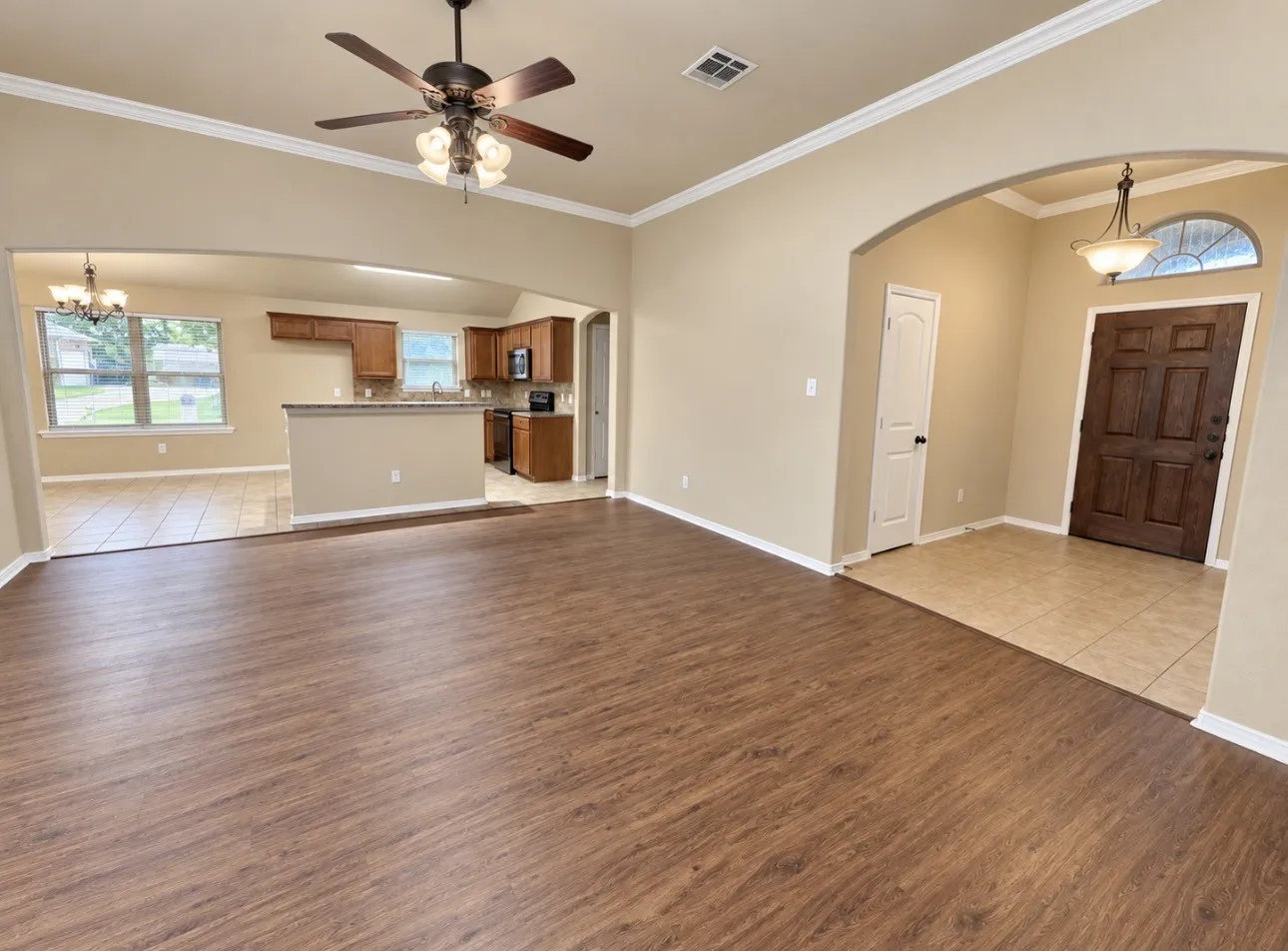 Wood-finish flooring throughout the main living area
