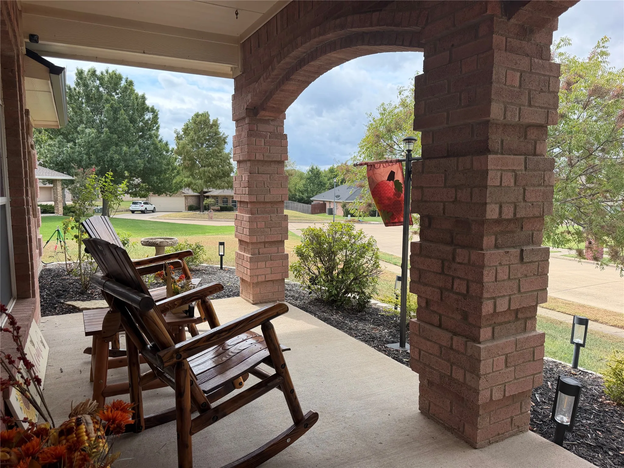 From the Moment You Arrive, You Will Love the Spacious Front Porch, Which Offers an Elevated, Commanding View of Your Extensive Front Yard.