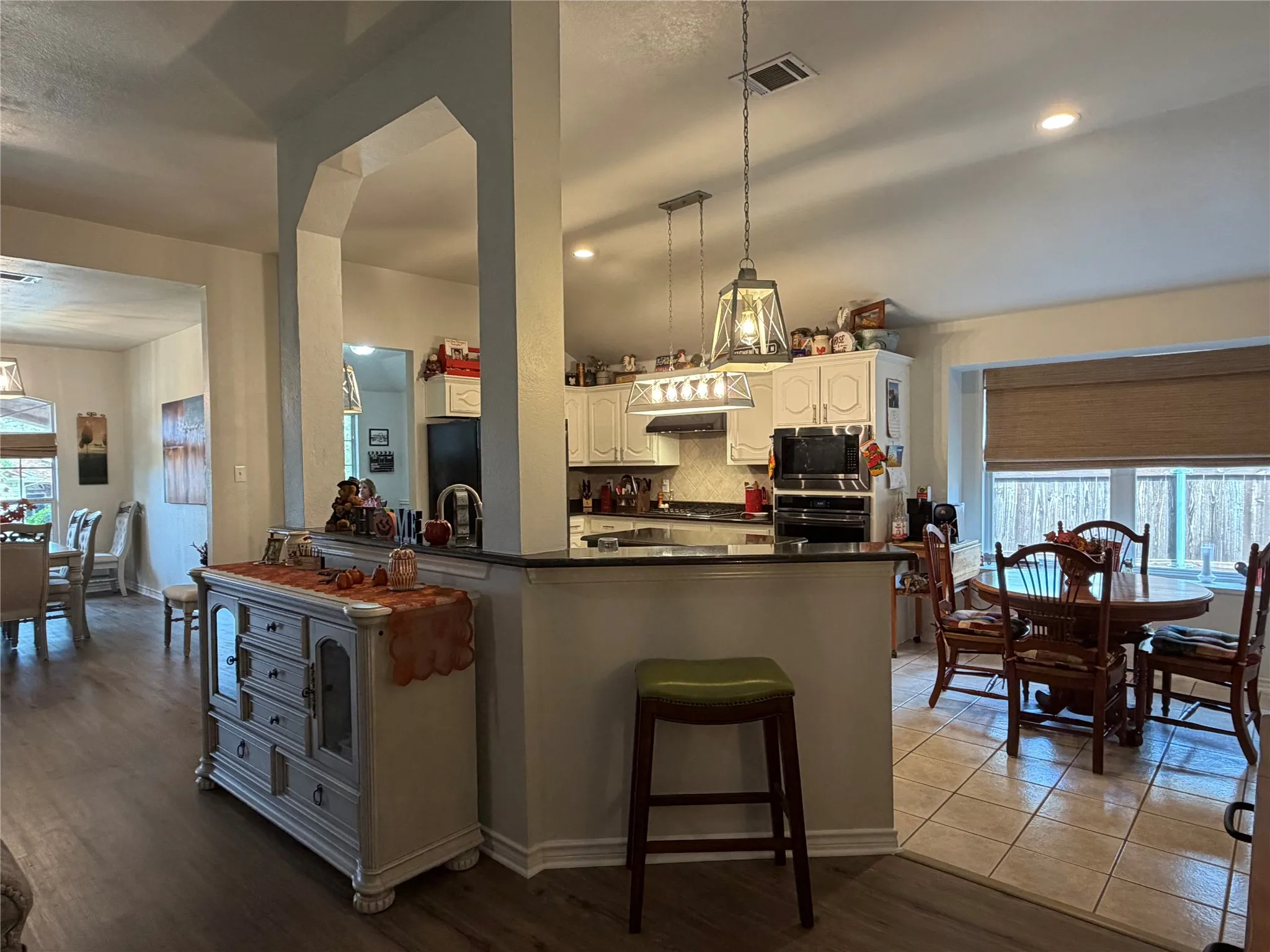 Front Door and Dining to the Left, Kitchen in the Middle, Breakfast Area to the Right.