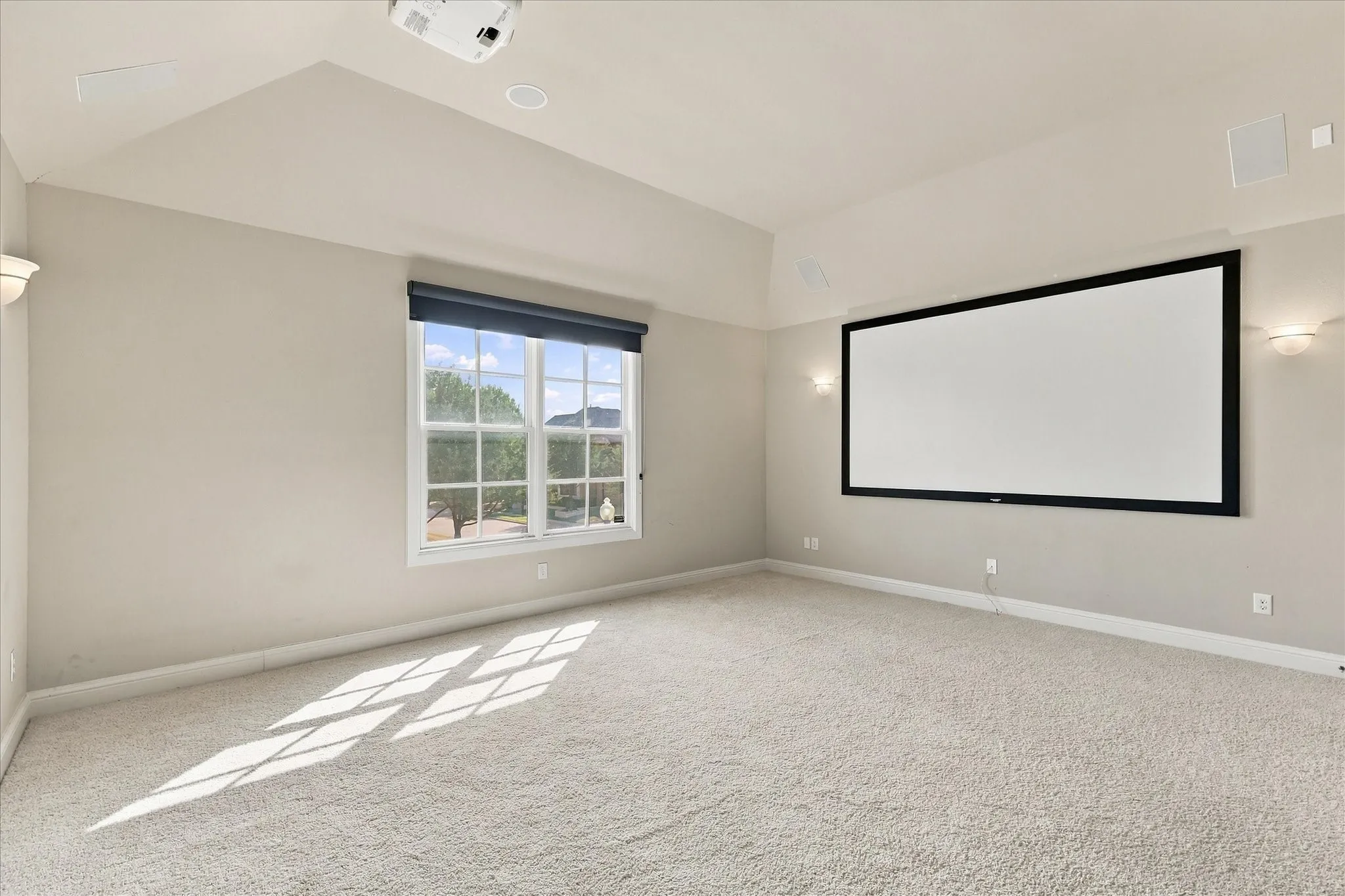 Upstairs media room. Screen stays!