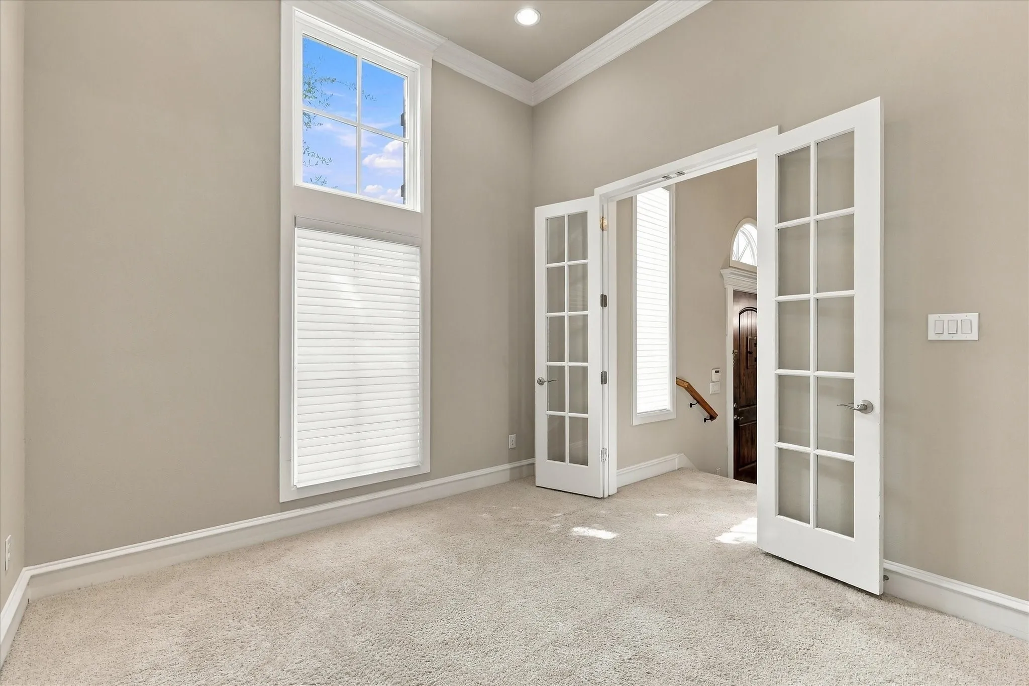 Study or bonus room with French doors