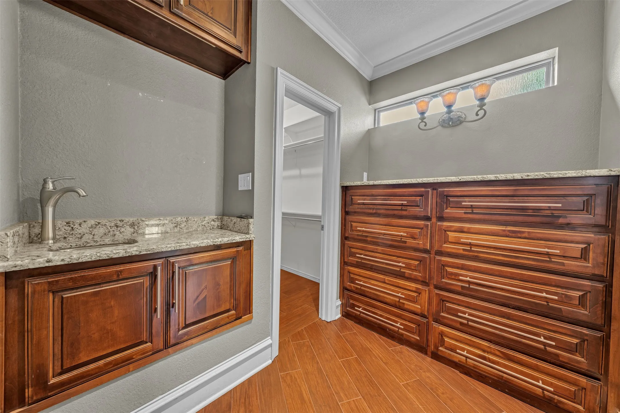 Coffee bar and built in storage.