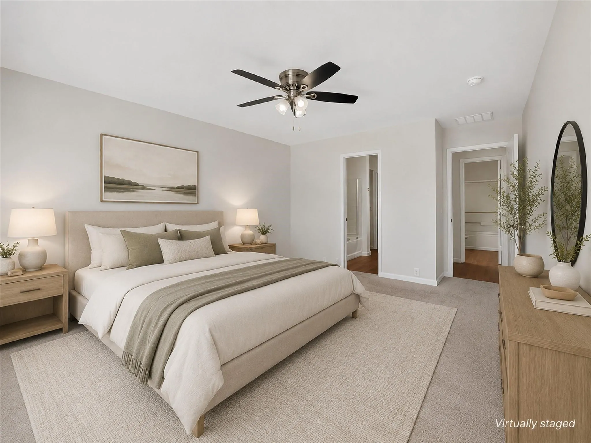 Carpeted flooring, ceiling fan, and light-toned wall finishes