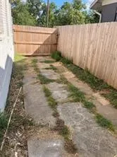 View of fenced backyard