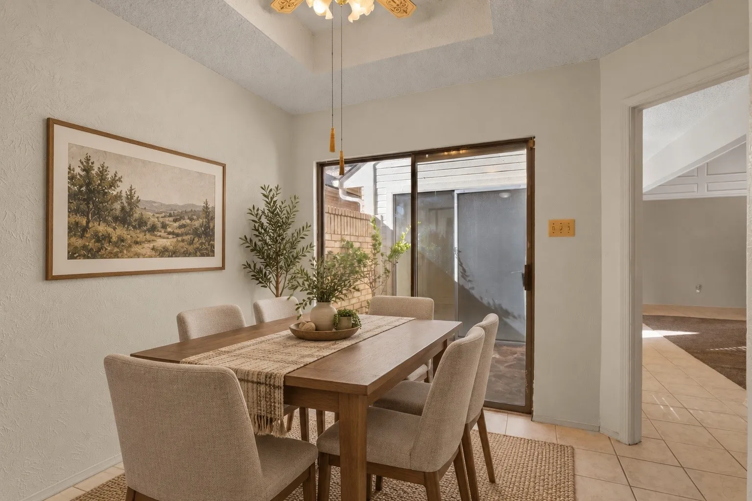 Virtually staged dining room showcasing a stylish, inviting setup.
