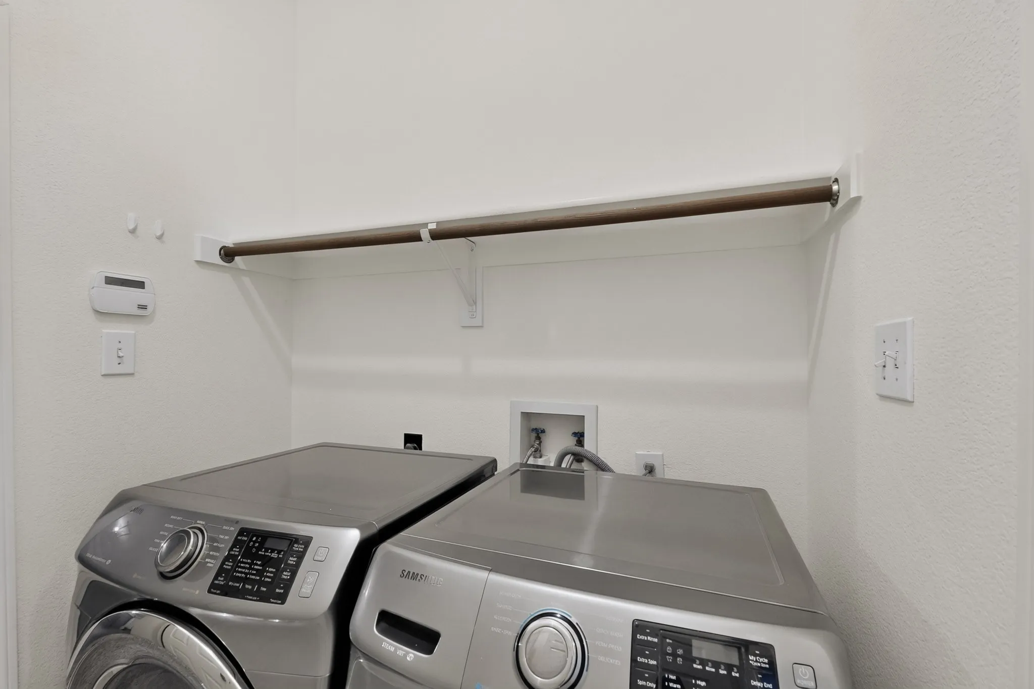 Upper shelf with a hanging rod