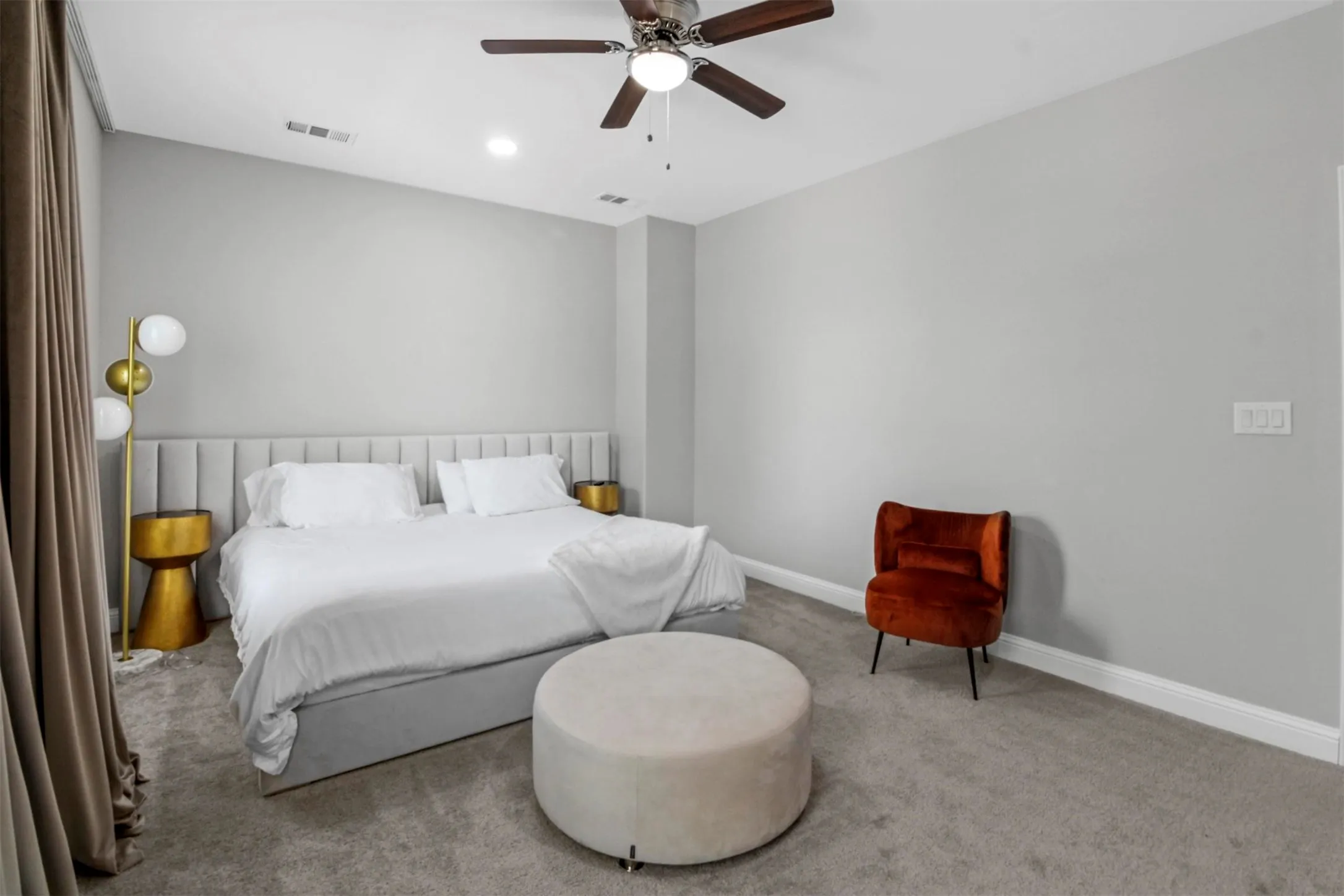 Vaulted ceiling with an attached ceiling fan, recessed lighting, and light gray wall paint