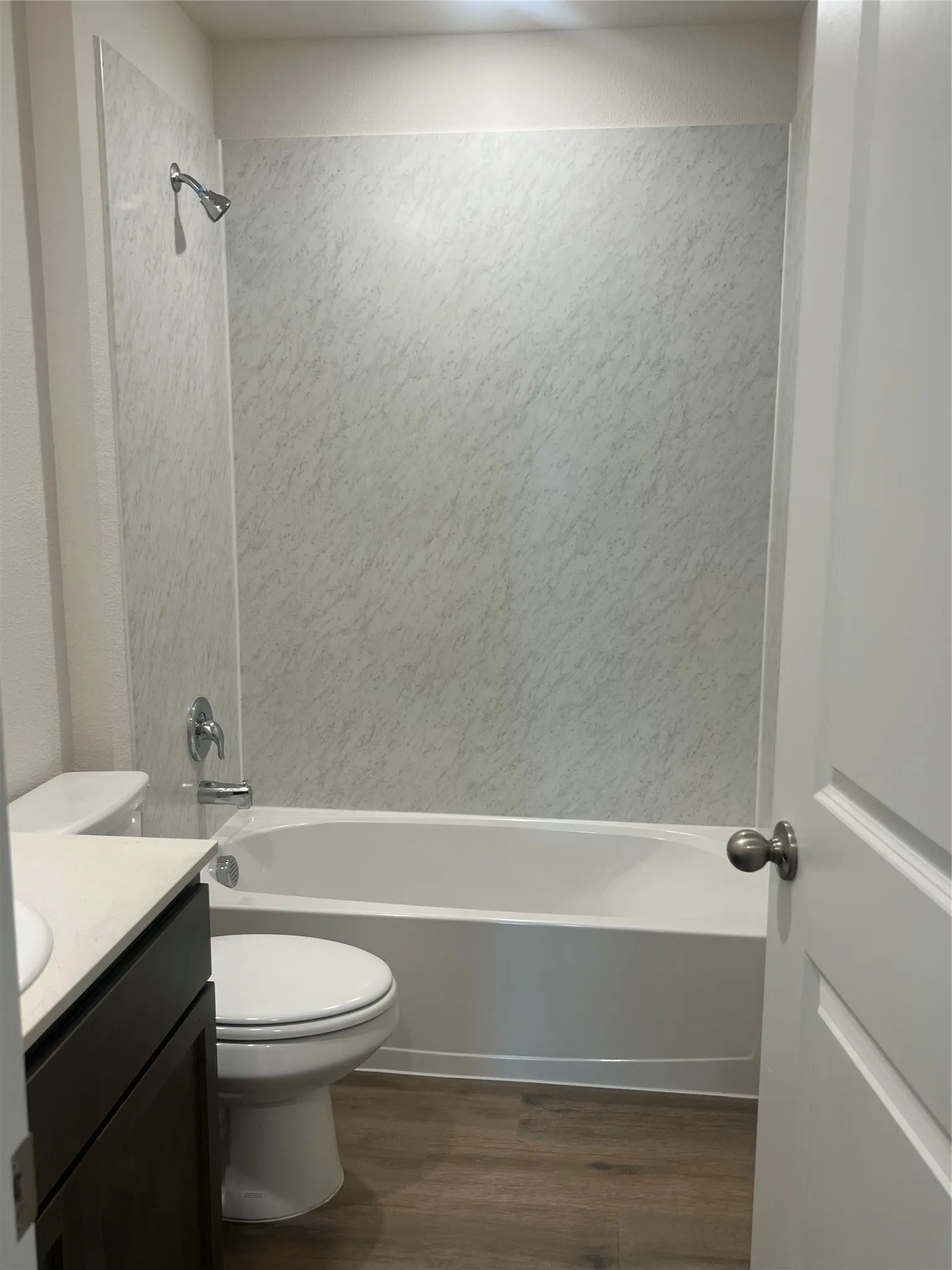 Bathroom with shower / bath combination, vanity