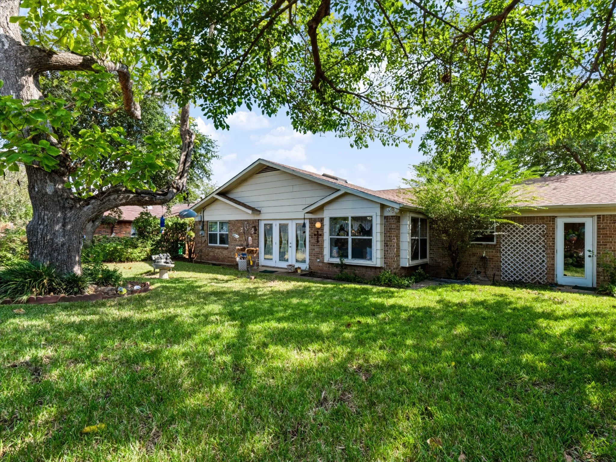 Expansive lawn with mature trees