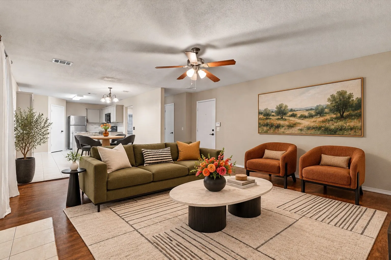Virtually Staged Open-concept living area featuring wood-finish flooring, a ceiling fan, and recessed lighting
