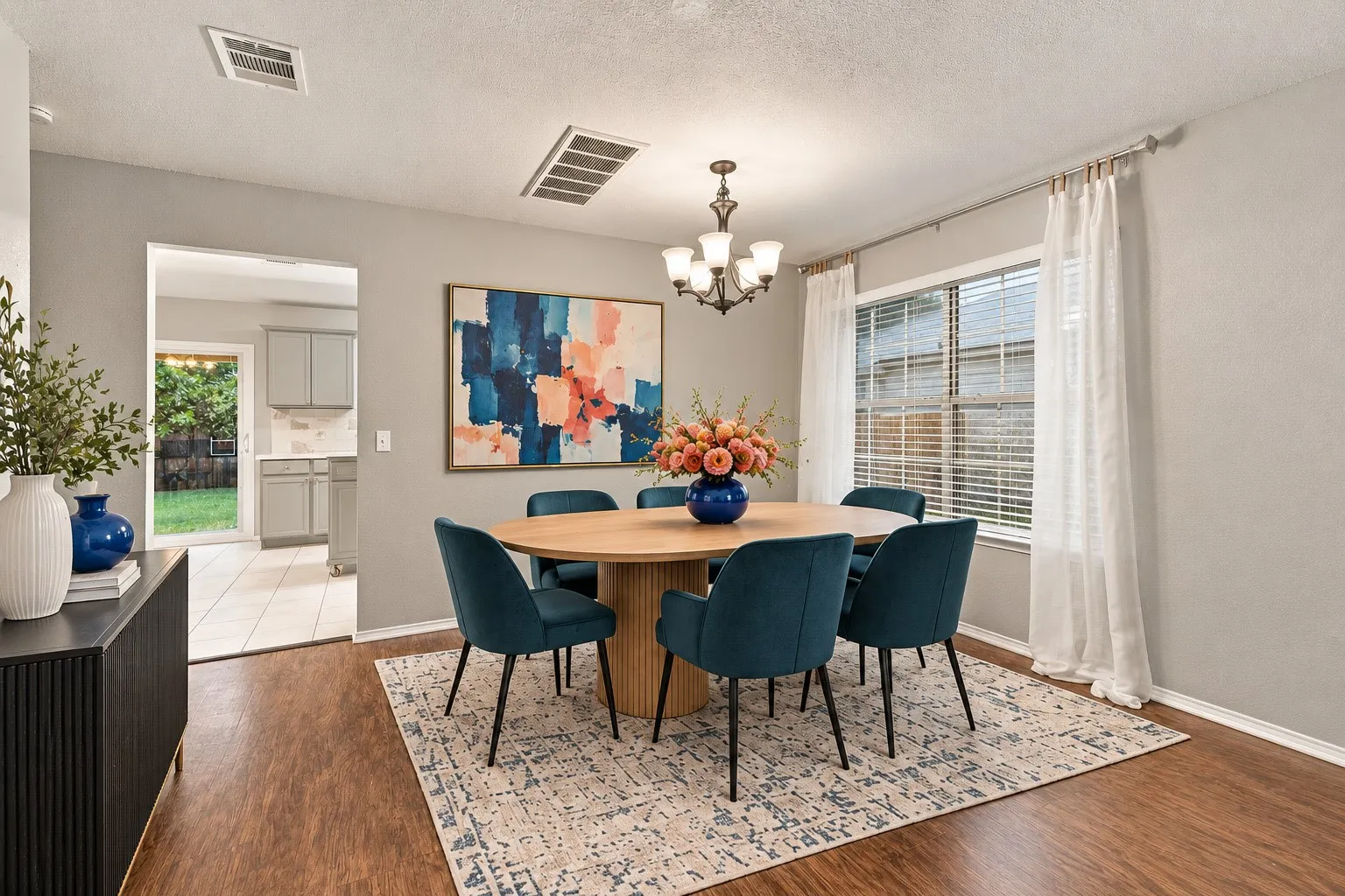 Virtually Staged Wood-finish flooring, recessed lighting, and a multi-pane window with blinds