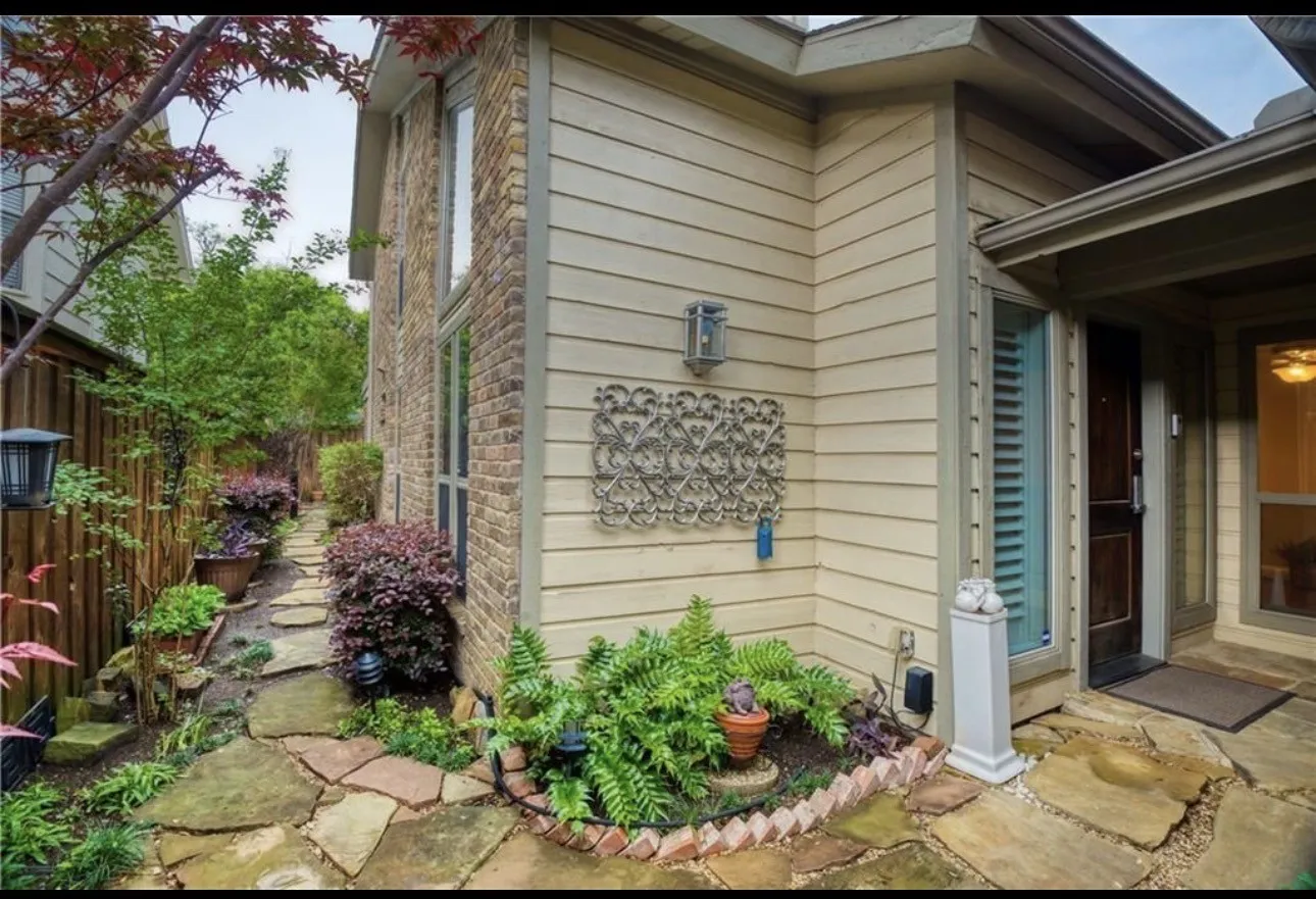 Beautifully designed by Mark Schecter this two story duplex lives like a townhome.